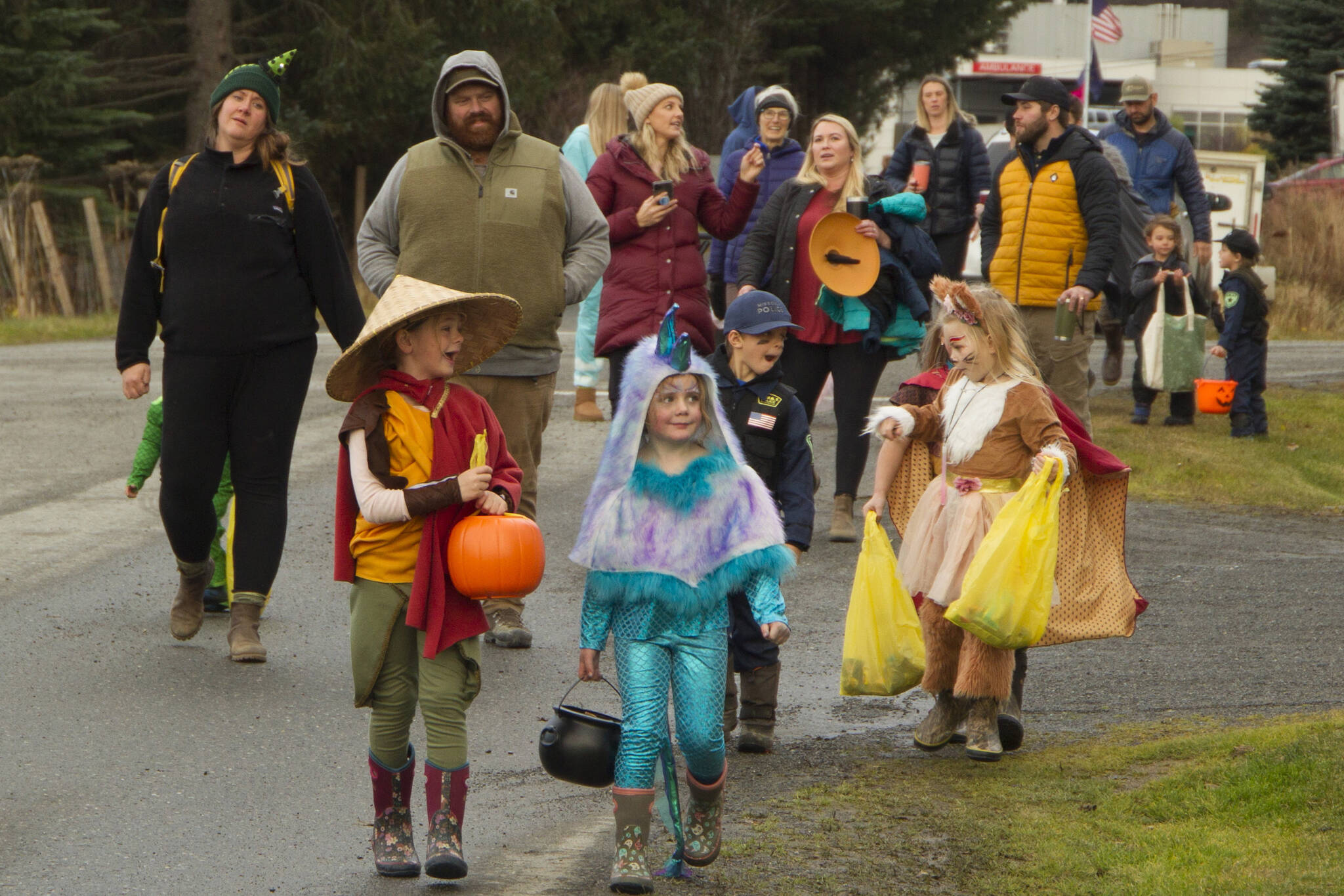 Lions and tigers and bears, oh my! Creatures of all kinds head down Bayview Avenue in search of candy and treats on Halloween. (Photo by Sarah Knapp/Homer News)