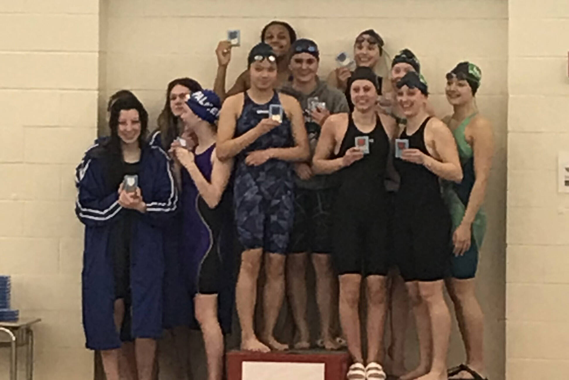 The Lady Mariners took first place in the 200 freestyle relay during the Northern Lights Conference meet Saturday, Oct. 30, at the Palmer Pool and are state bound! Pictured on top of the podium are McKenna Carlin, Cassidy Carroll, Jillian Crooks and Carly Nelson. (Photo provided by Dana Jaworski)