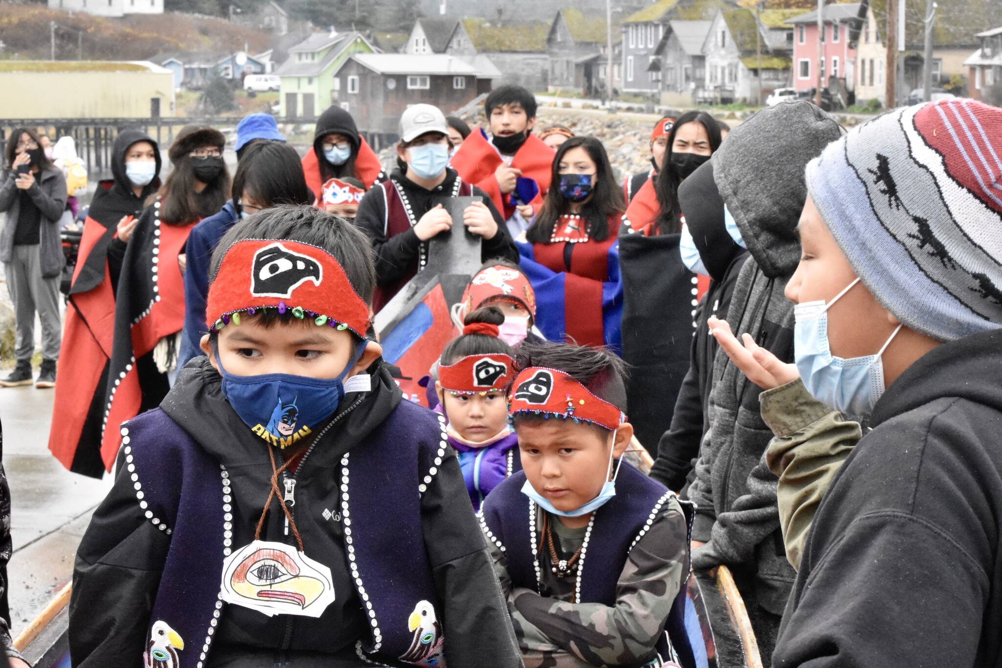 Students from Angoon donned their regalia on Tuesday, Oct. 26, 2021, for the 139th anniversary of the bombardment of Angoon by the U.S. Navy. Despite the violence, Angoon residents say the fact the village remains is a testament to their endurance. (Peter Segall / Juneau Empire)