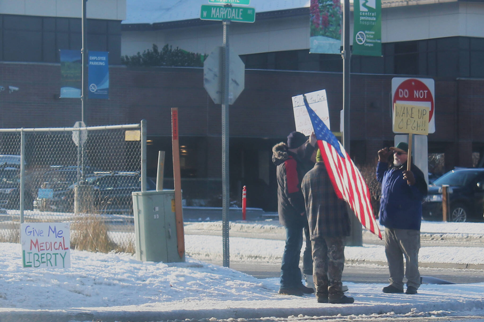 Protesters demonstrate outside of Central Peninsula Hospital on Friday, Nov. 5, 2021 in Soldotna, Alaska. The group was advocating for the use of ivermectin as a treatment option for a COVID-19 patient hospitalized at CPH. (Ashlyn O’Hara/Peninsula Clarion)