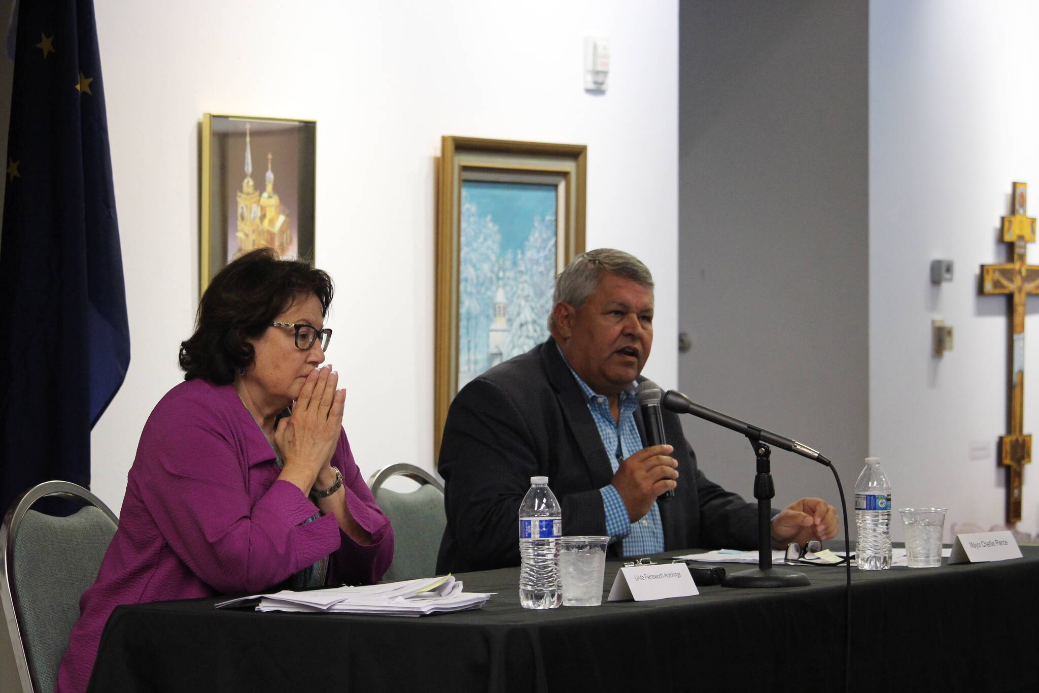 Linda Farnsworth-Hutchings, left, and Kenai Peninsula Borough Mayor Charlie Pierce, right, participate in a mayoral candidate forum hosted by the Kenai Chamber of Commerce at the Kenai Visitor and Cultural Center on Sept. 9, 2020. (Photo by Brian Mazurek/Peninsula Clarion file)