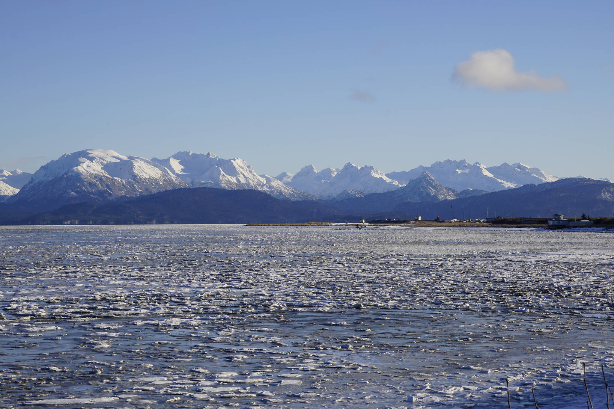 Ice has begun to fill Mud Bay, as seen from the Homer Spit on Tuesday, Nov. 17, 2021, in Homer, Alaska. (Photo by Michael Armstrong/Homer News)