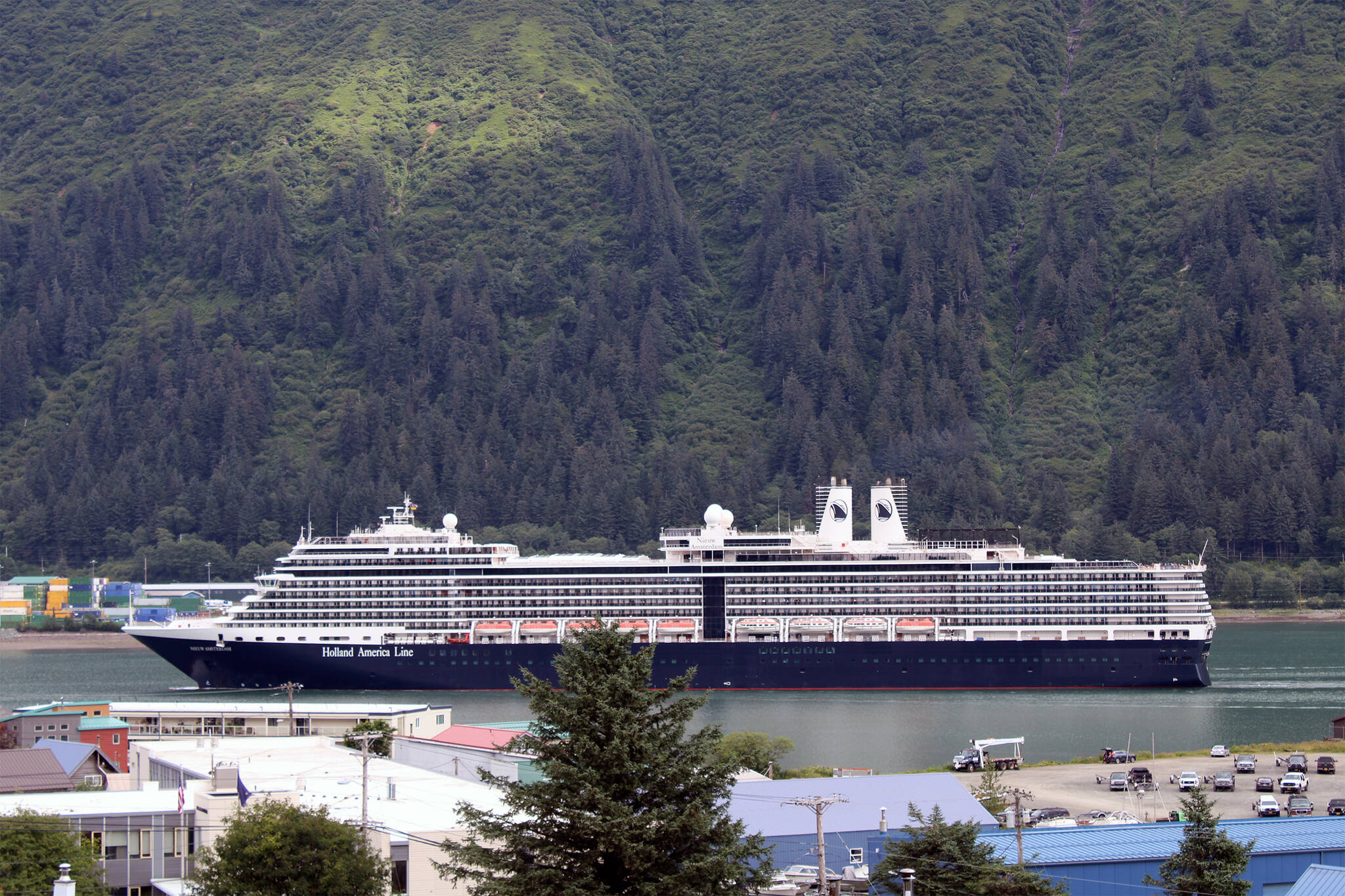 The MS Nieuw Amsterdam sails into Juneau on July 26, 2021. On Monday night, city leaders reviewed the results of a community survey aimed at learning more about community attitudes about the impact of large cruise ships. (Dana Zigmund/Juneau Empire)