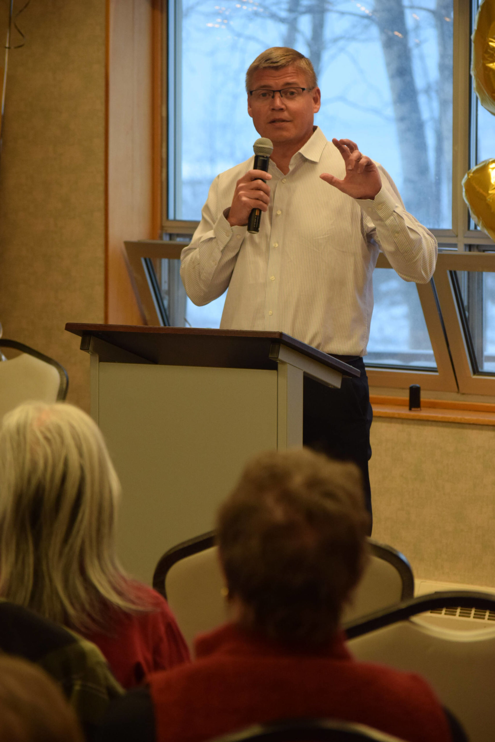 City Manager Paul Ostrander speaks at the Kenai Senior Center's 50th anniversary reception on Tuesday, Nov. 30, 2021. (Camille Botello/Peninsula Clarion)
