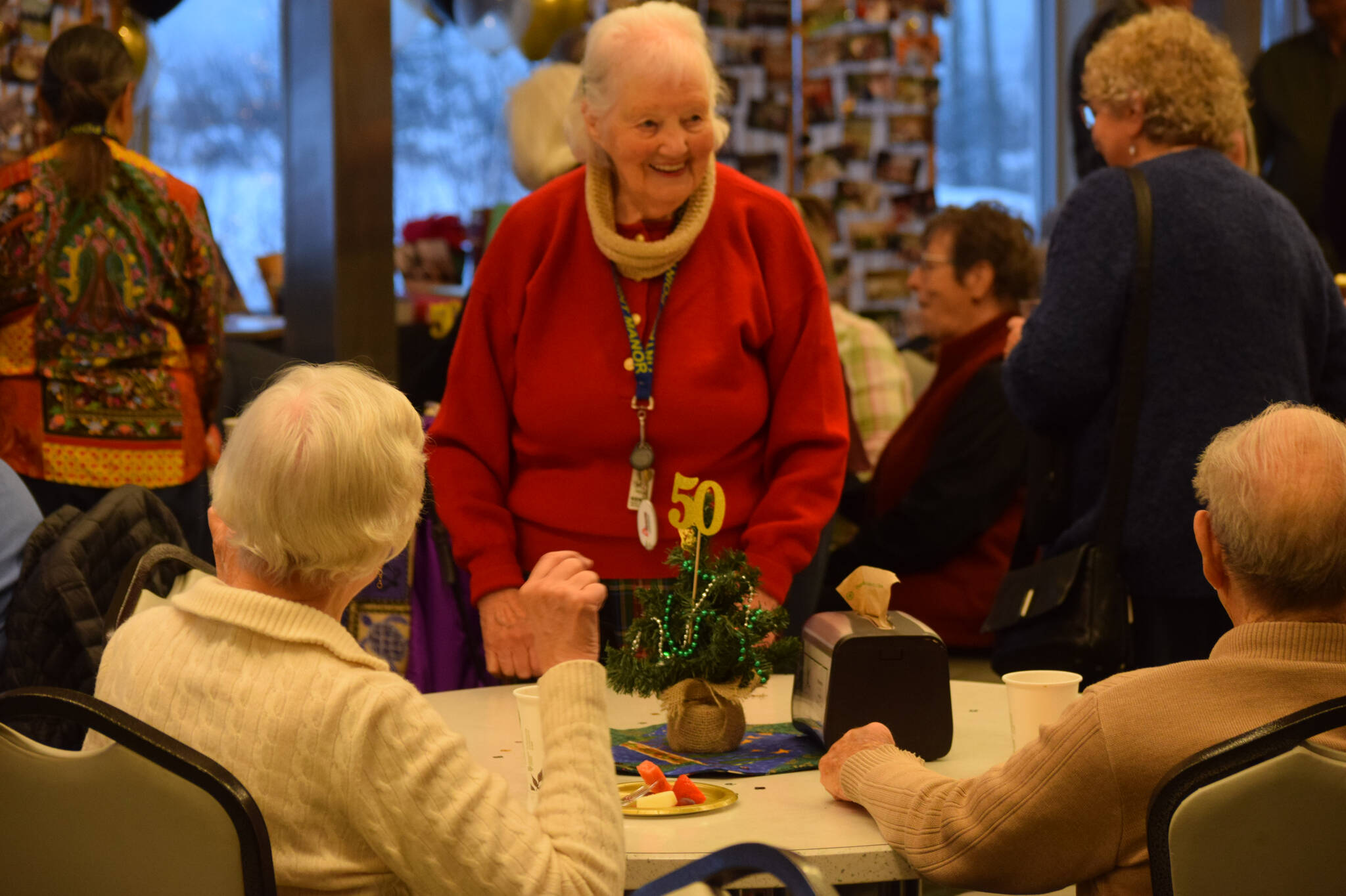 Community members gather for the Kenai Senior Center's 50th anniversary reception on Tuesday, Nov. 30, 2021. (Camille Botello/Peninsula Clarion)