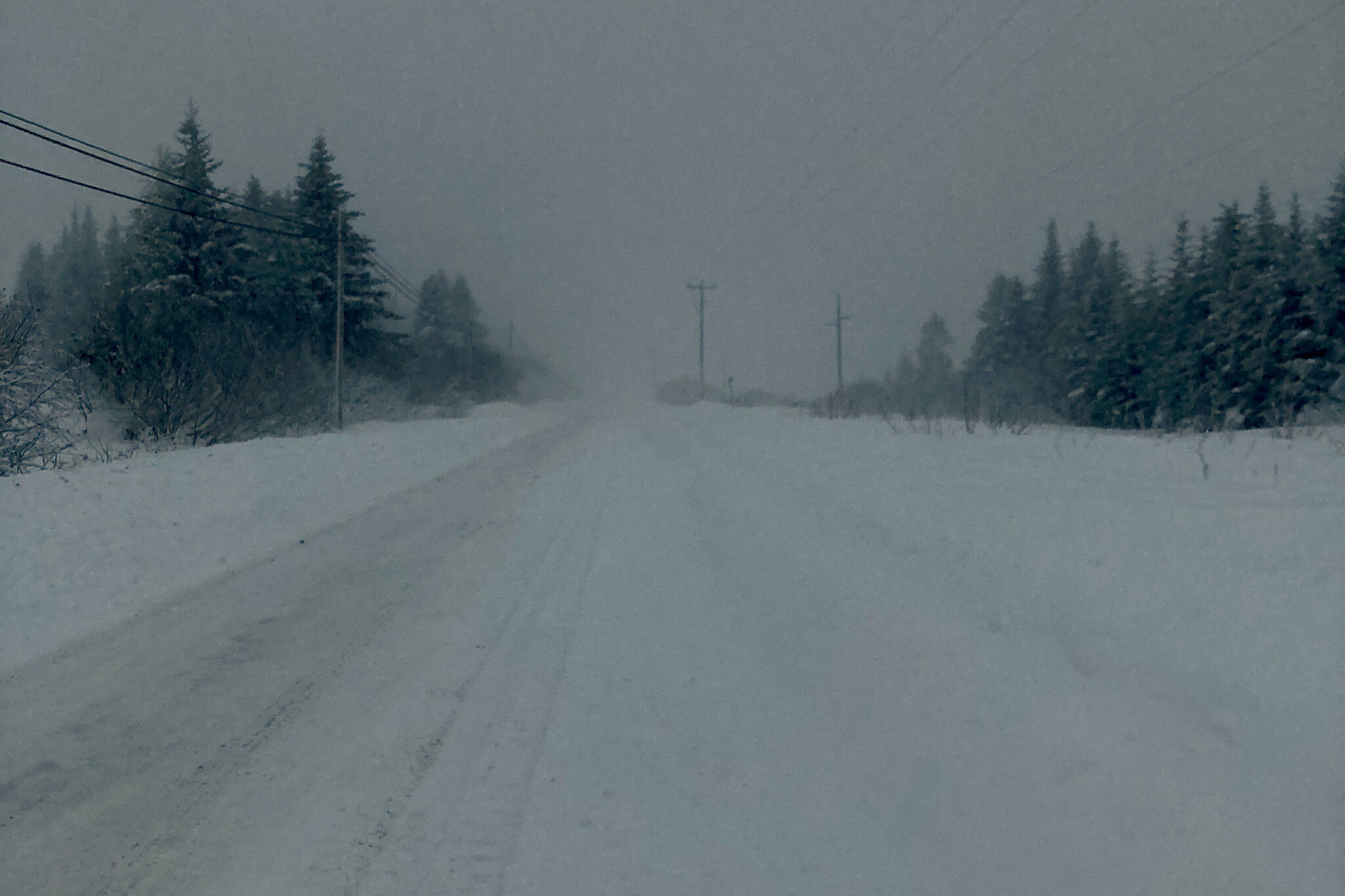 Diamond Ridge Road near Homer, Alaska, had been plowed on Monday morning, Dec. 5, 2021, but visibility was limited. (Photo by Michael Armstrong/Homer News)