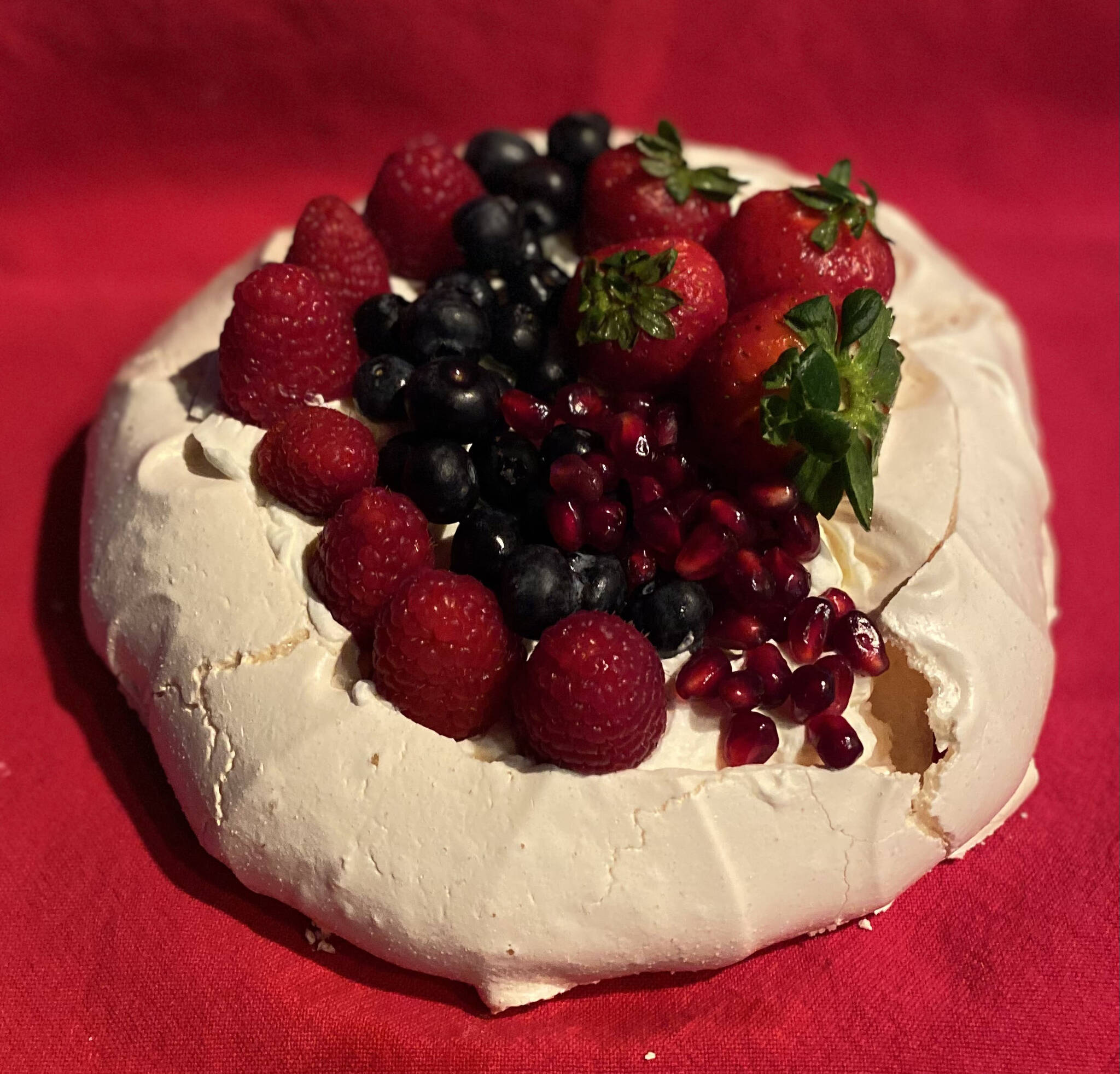 The merigue-based pavlova is a lighter-than-air dessert than can be topped with an assortment of fruits. (Photo by Tressa Dale/Peninsula Clarion)