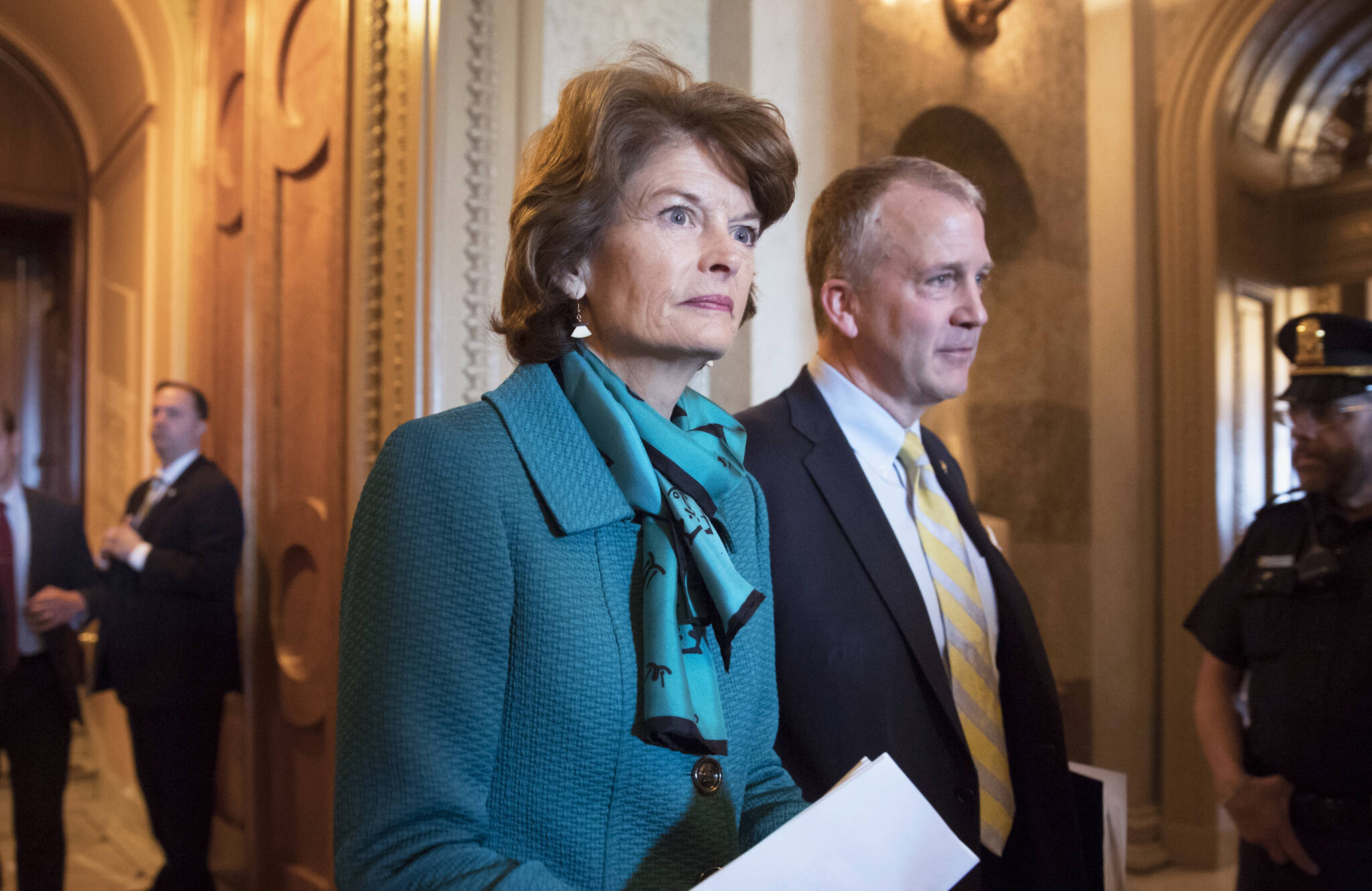 AP Photo / J. Scott Applewhite
Sen. Lisa Murkowski, R-Alaska, and Sen. Dan Sullivan, R-Alaska, leave the chamber after a vote on Capitol Hill in Washington, early Wednesday, May 10, 2017. Jay Allen Johnson, 65, who faced charges of sending a series of profanity-laced voice messages to the two senators, entered guilty pleas, Monday, Jan. 3, 2022, in federal court in Fairbanks, Alaska, to two counts of threatening to kill a U.S. official. U.S. District Judge Ralph Beistline accepted Johnson’s pleas and set sentencing for April 8.