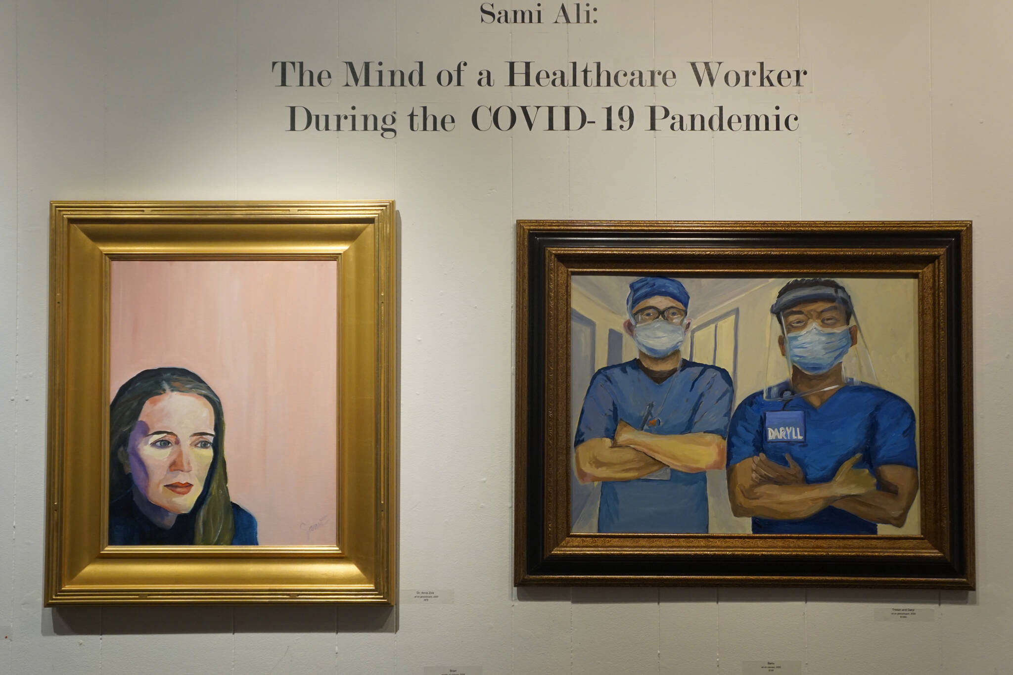 Two paintings in in Dr. Sami Ali’s exhibit, “The Mind of a Healthcare Worker During the COVID-19 Pandemic,” showing in January 2022 at the Homer Council on the Arts in Homer, Alaska. (Photo by Michael Armstrong/Homer News)