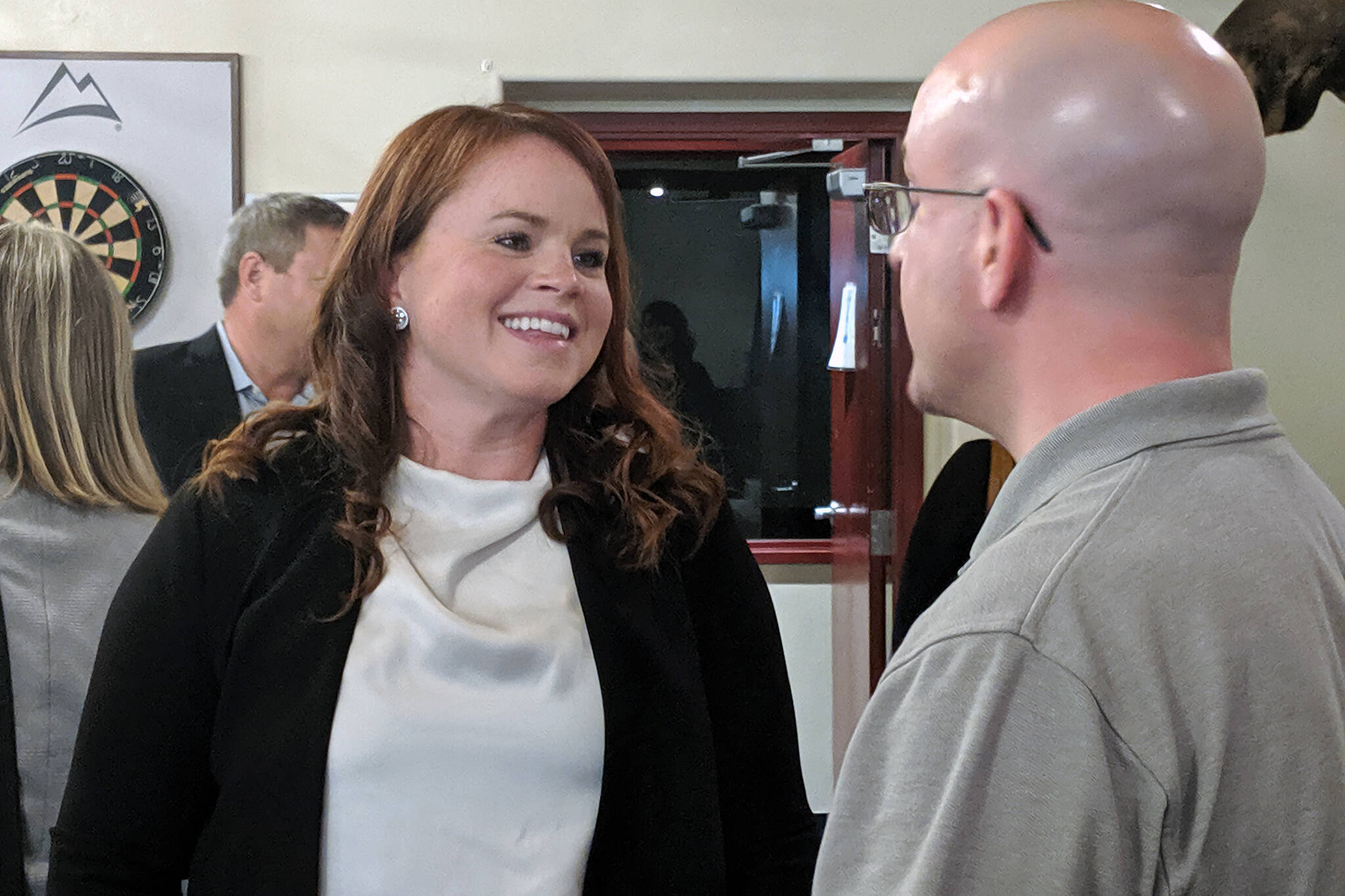 District Attorney Angie Kemp speaks with Assembly member Wade Bryson after at September 2019 presentation for a Greater Juneau Chamber of Commerce luncheon. Kemp has been named director of the Alaska Department of Law's Criminal Division. (Ben Hohenstatt / Juneau Empire File)