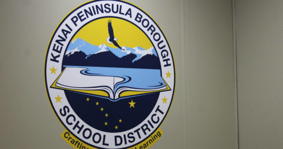 Ashlyn O’Hara/Peninsula Clarion 
The logo for the Kenai Peninsula Borough School District is displayed inside the George A. Navarre Borough Admin Building on Thursday, July 22 in Soldotna.