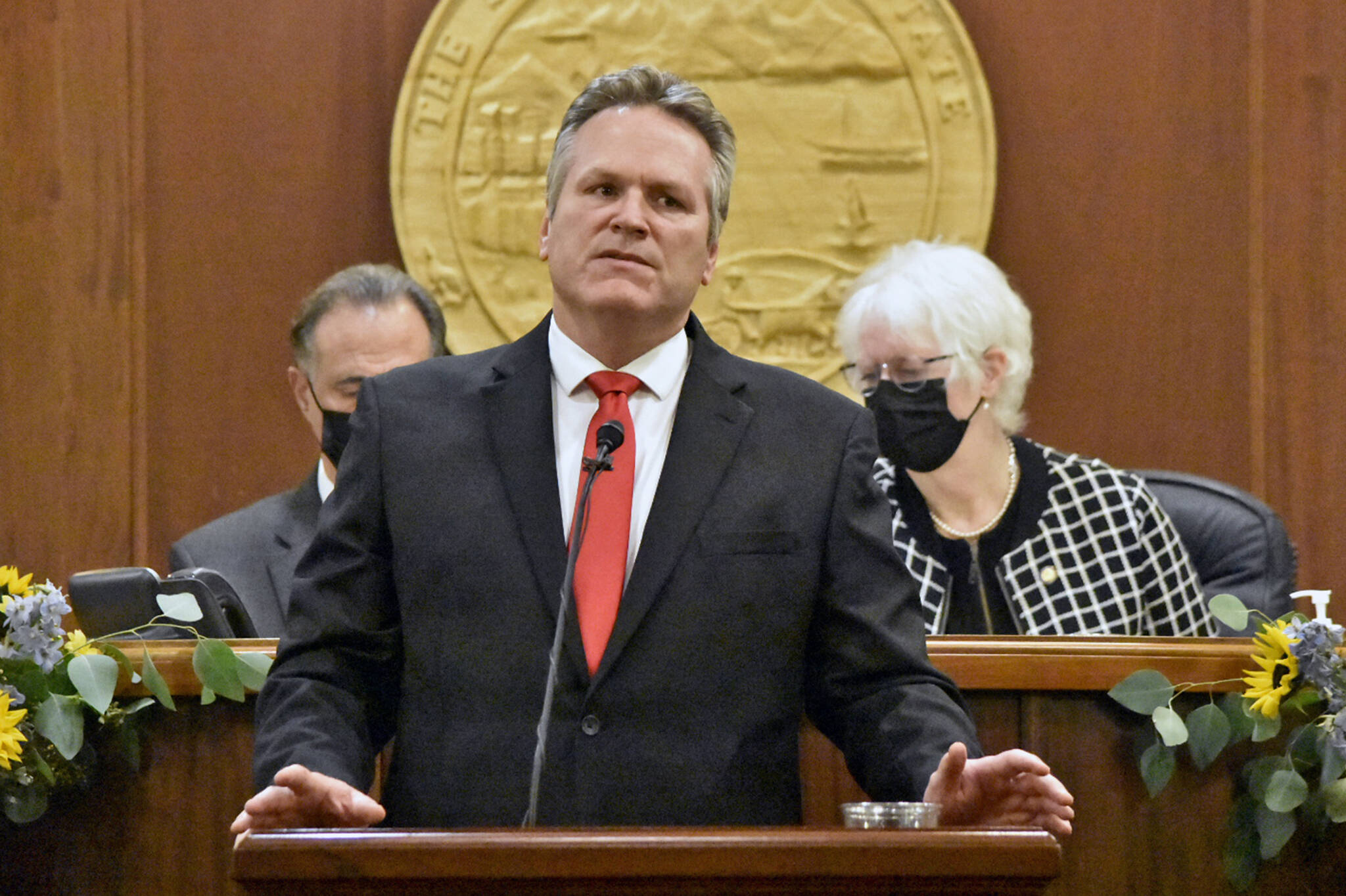 Gov. Mike Dunleavy speaks to a joint meeting of the Alaska State Legislature at the Alaska State Capitol on Tuesday, Jan. 25, 2022, for his fourth State of the State address of his administration. Dunleavy painted a positive picture for the state despite the challenges Alaska has faced during the COVID-19 pandemic and its effects on the economy. (Peter Segall / Juneau Empire)