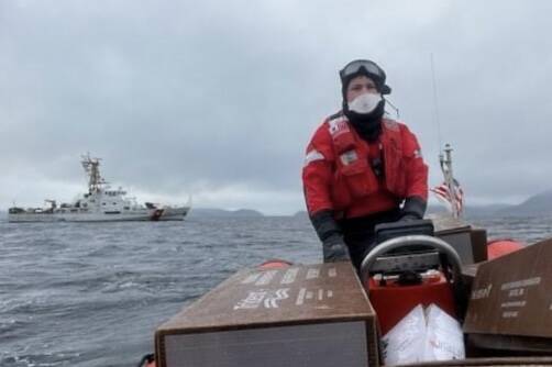 Courtesy Photo / Lt. j.g. Matthew Hall
Coxswain Petty Officer 2nd Class Thomas Dillbeck navigates the Coast Guard Cutter Anacapa’s small boat to Wrangell harbor to drop off a boatload of donations from an event in Petersburg.