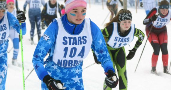 Soldotna's Jordan Ruffner starts the girls 5-kilometer classic mass start race Saturday, Feb. 12, 2022, at the Region III ski championships at Tsalteshi Trails just outside of Soldotna, Alaska. (Photo by Camille Botello/Peninsula Clarion)