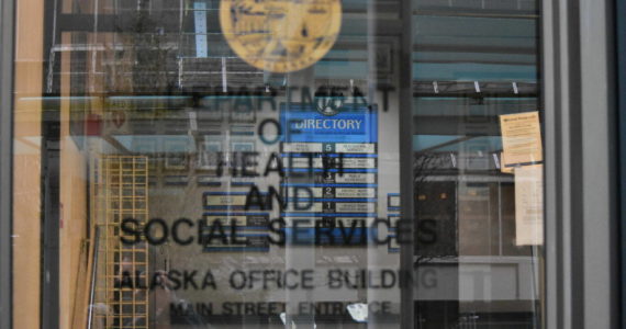 The entrance to the Alaska Department of Health and Social Services building in downtown Juneau on Jan. 14, 2021. Gov. Mike Dunleavy has twice proposed splitting the department using an executive order, but the Division of Legislative Legal Services has raised issues with the most recent order. (Peter Segall / Juneau Empire file)