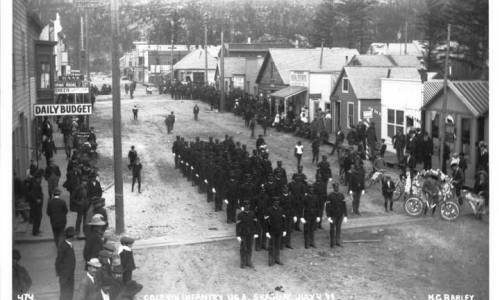 Black soldiers of Company L, 24th Infantry, famously known as "Buffalo Soldiers," parade on 5th Avenue in Skagway, between Broadway and State streets, in front of the Daily Budget newspaper on July 4, 1899. A recent book from a University of Alaska Anchorage history professor traces the long history of Black Americans in Alaska. (Courtesy image / Alaska's Digital Archives)