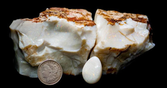 This photo provided by Alaska Premier Auctions and Appraisals shows an opal specimen, Dec. 20, 2021. One of the largest opals in the world was sold for nearly $144,000 at auction in Alaska on Sunday, Feb. 20, 2022. The opal, dubbed the “Americus Australis,” weighs more than 11,800 carats and is one of the largest gem-quality opals in existence, according to the auction house Alaska Premier Auctions & Appraisals. (Dana Fuentes / Alaska Premier Auctions and Appraisals)