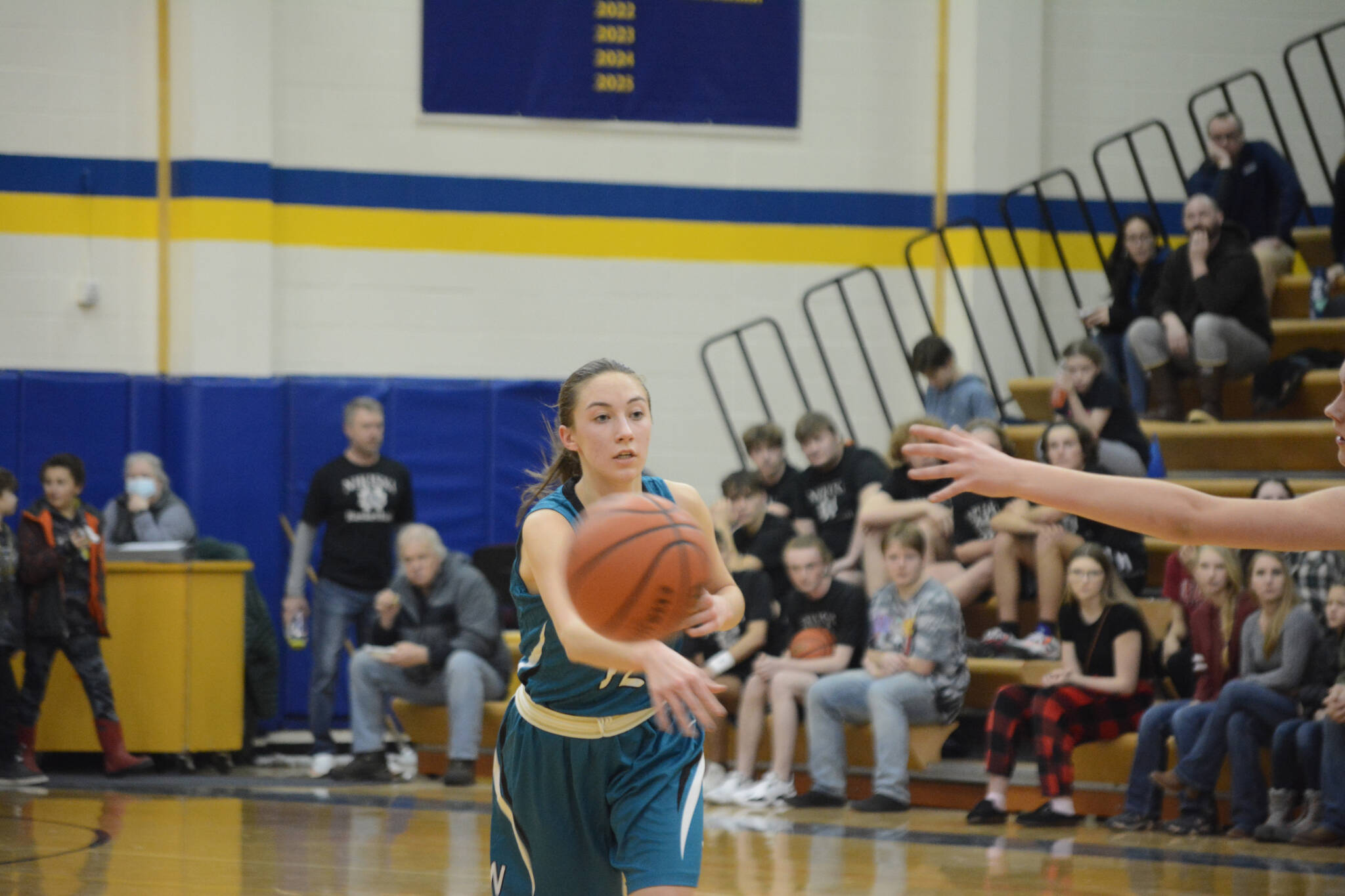 Lady Bulldog Rylee Ellis makes a pass in a game against the Lady Mariners during Senior Night on Friday, Feb. 25, 2022, at the Alice Witte Gym at Homer High School in Homer, Alaska. (Photo by Michael Armstrong/Homer News)