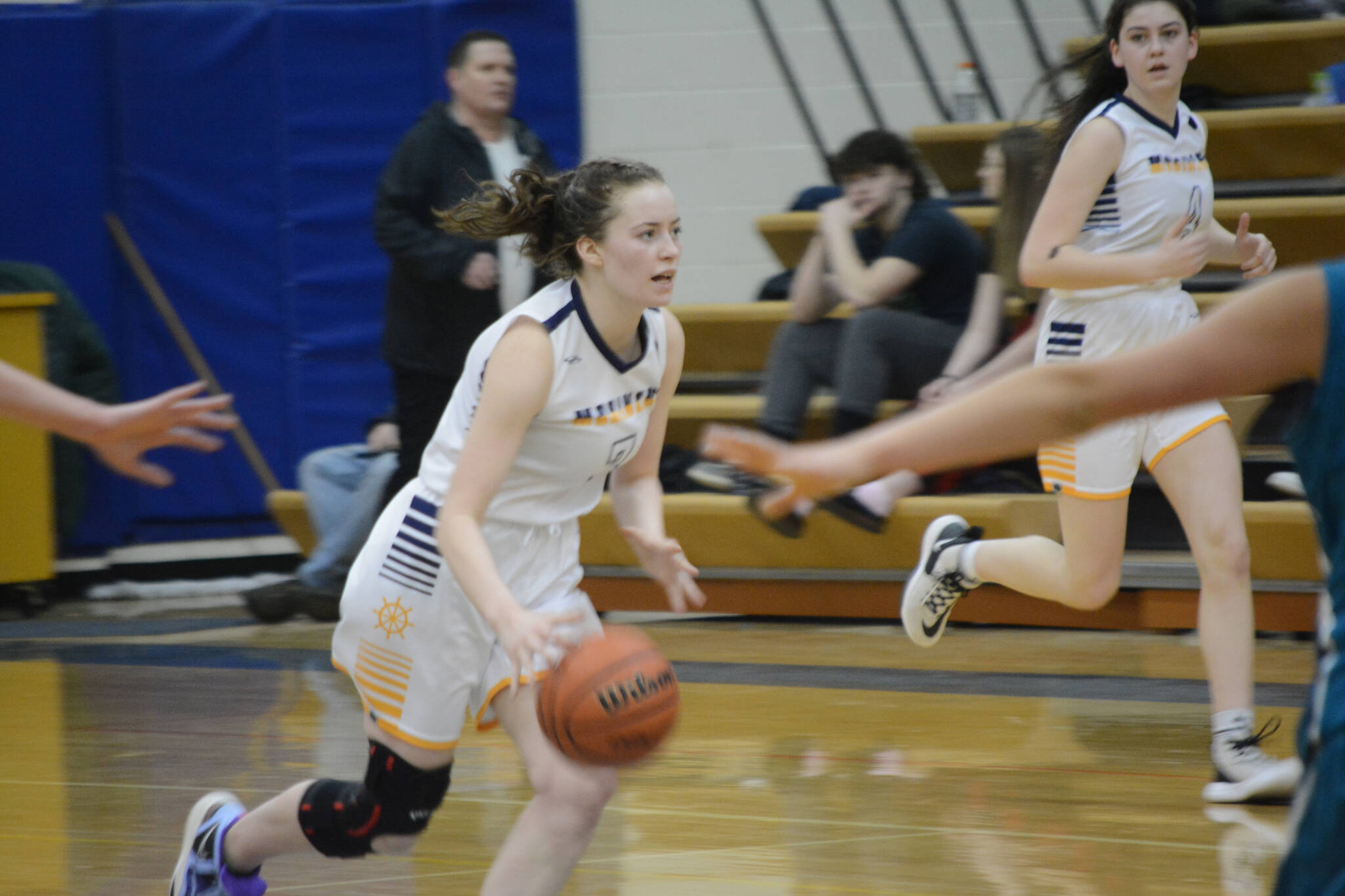 Lady Mariner Kaylin Anderson drives the ball down the court against the Lady Bulldogs during Senior Night on Friday, Feb. 25, 2022, at the Alice Witte Gym at Homer High School in Homer, Alaska. (Photo by Michael Armstrong/Homer News)