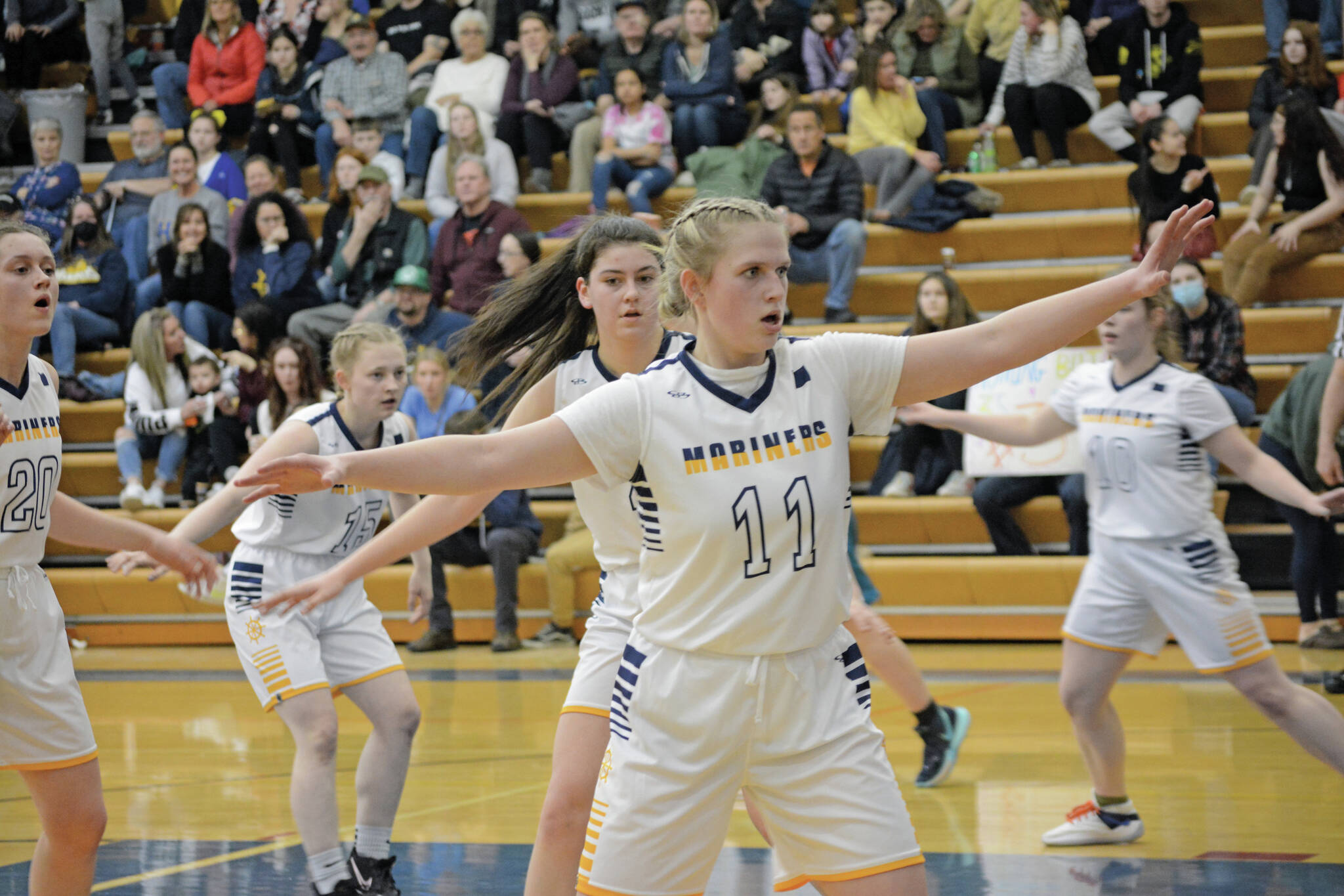 Lady Mariner Sydney Shelby and her teammates put up a defense against the Lady Bulldogs during Senior Night on Friday, Feb. 25, 2022, at the Alice Witte Gym at Homer High School in Homer, Alaska. Behind Shelby are, from left to right, Mel Morris, Hannah Stonorov, Delilah Harris, and Bethany Engebretsen. (Photo by Michael Armstrong/Homer News)