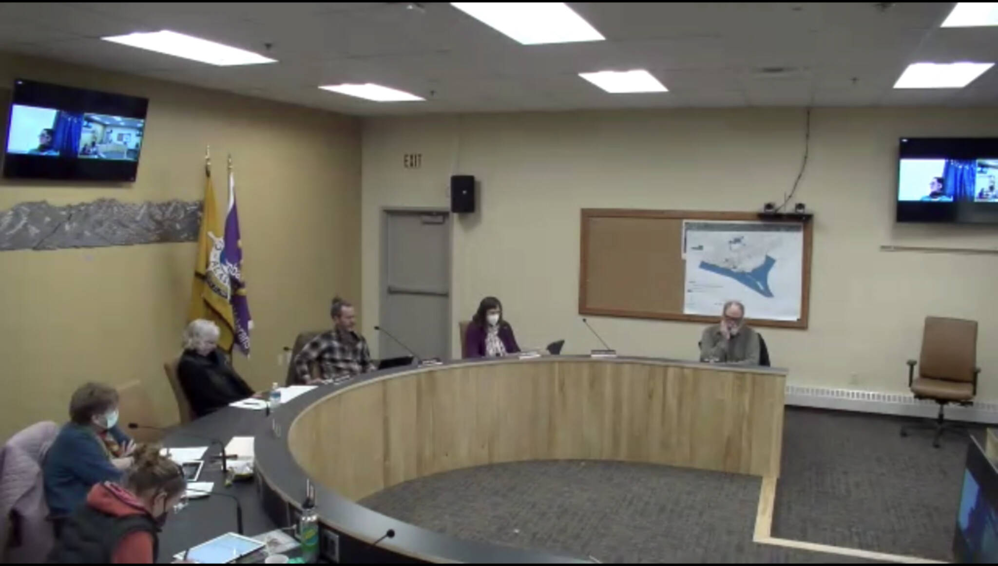 Homer Mayor Ken Castner, far right, and members of the Homer City Council meet on Monday, March 14, 2022, in the Cowles Council Chambers, Homer City Hall, in Homer, Alaska. Because of lower COVID-19 pandemic levels, face masks are now optional at City Hall (Screenshot)