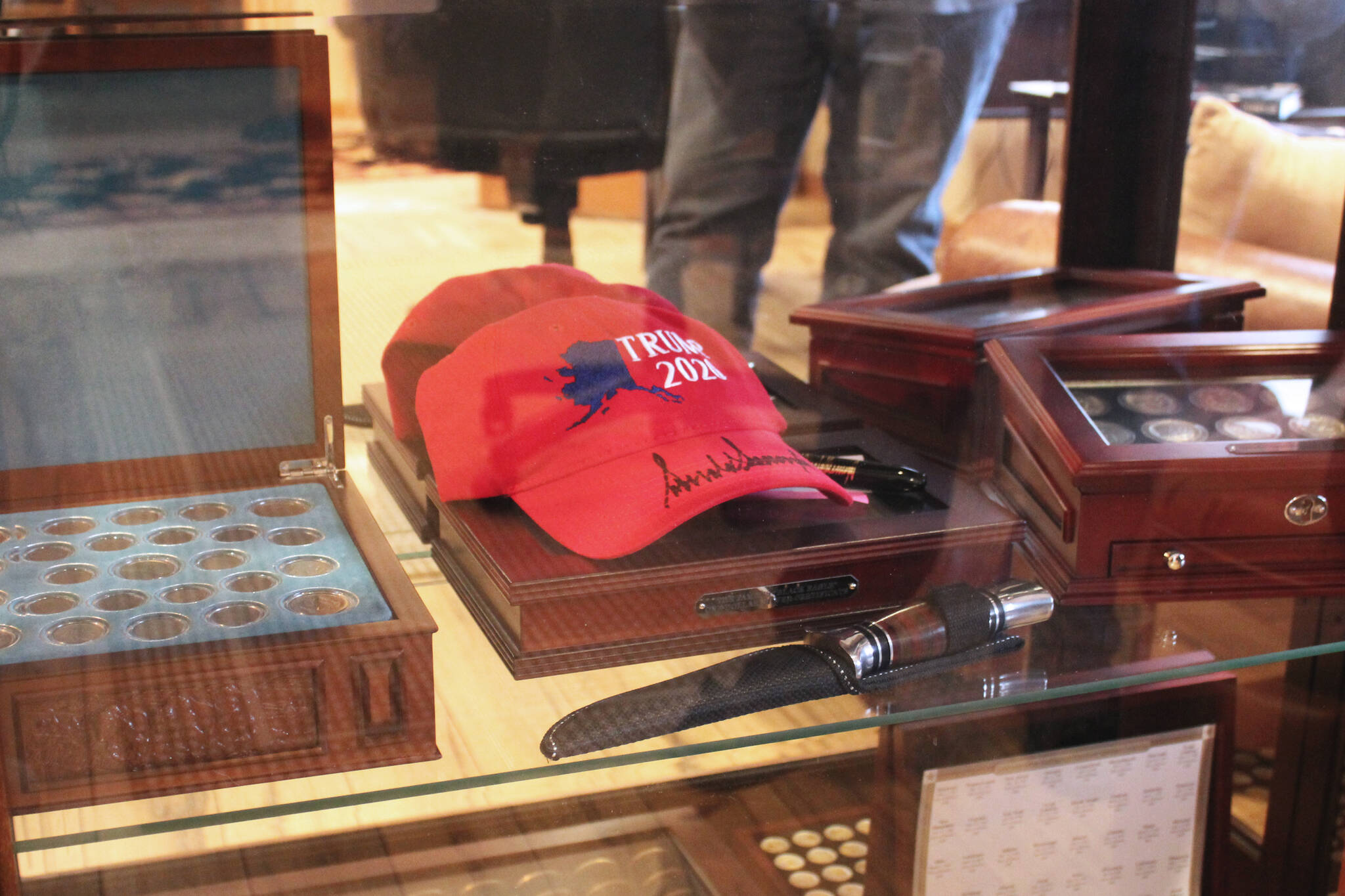 A hat signed by former U.S. President Donald Trump is displayed in Charlie Pierce’s home office on Thursday, March 10, 2022 in Sterling, Alaska. (Ashlyn O’Hara/Peninsula Clarion)