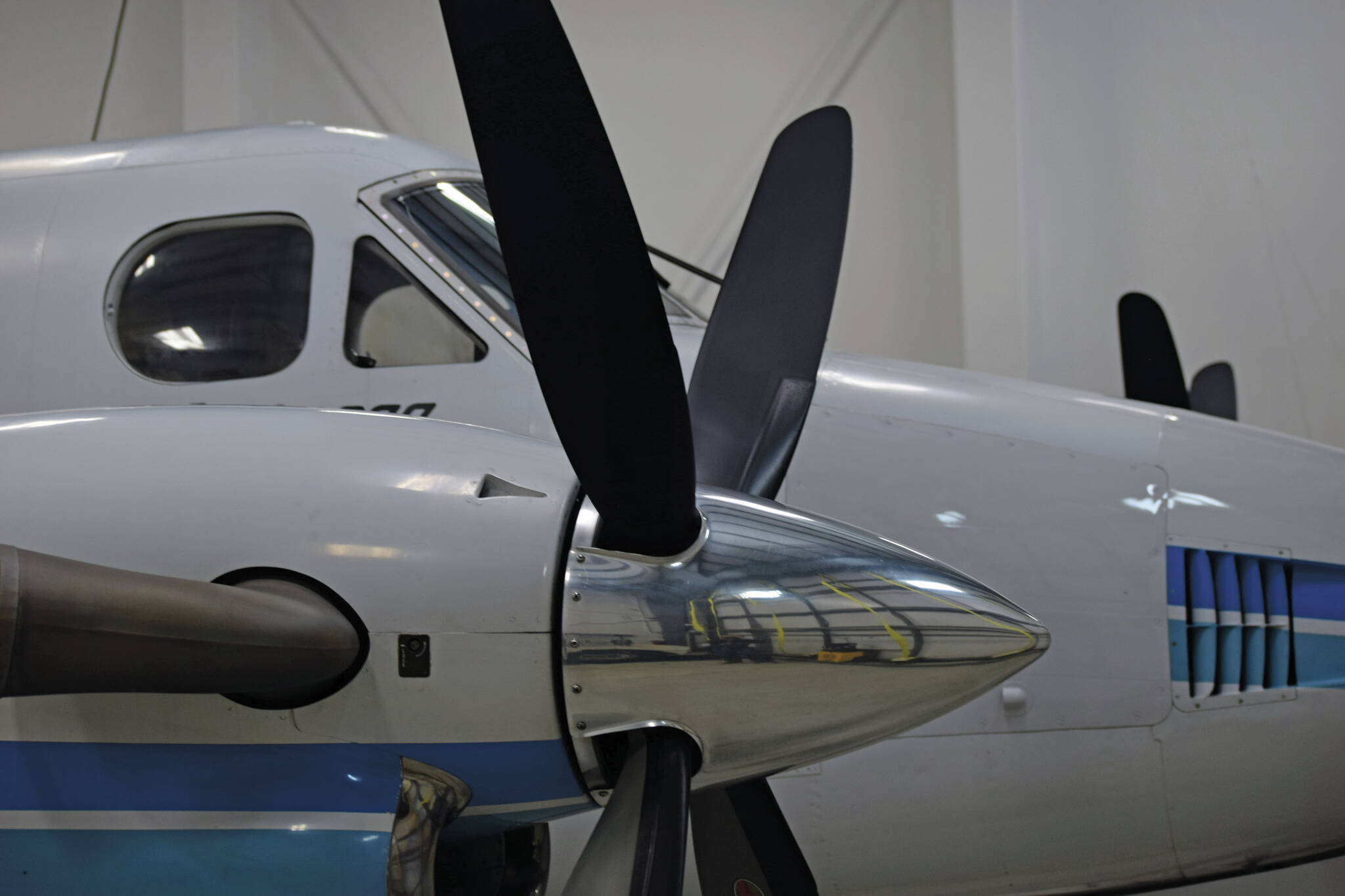 A nine-seat Beechcrafter Super King Air B200 plane sits in a hanger at Kenai Aviation in Kenai, Alaska on Wednesday, March 9, 2022. (Camille Botello/Peninsula Clarion)