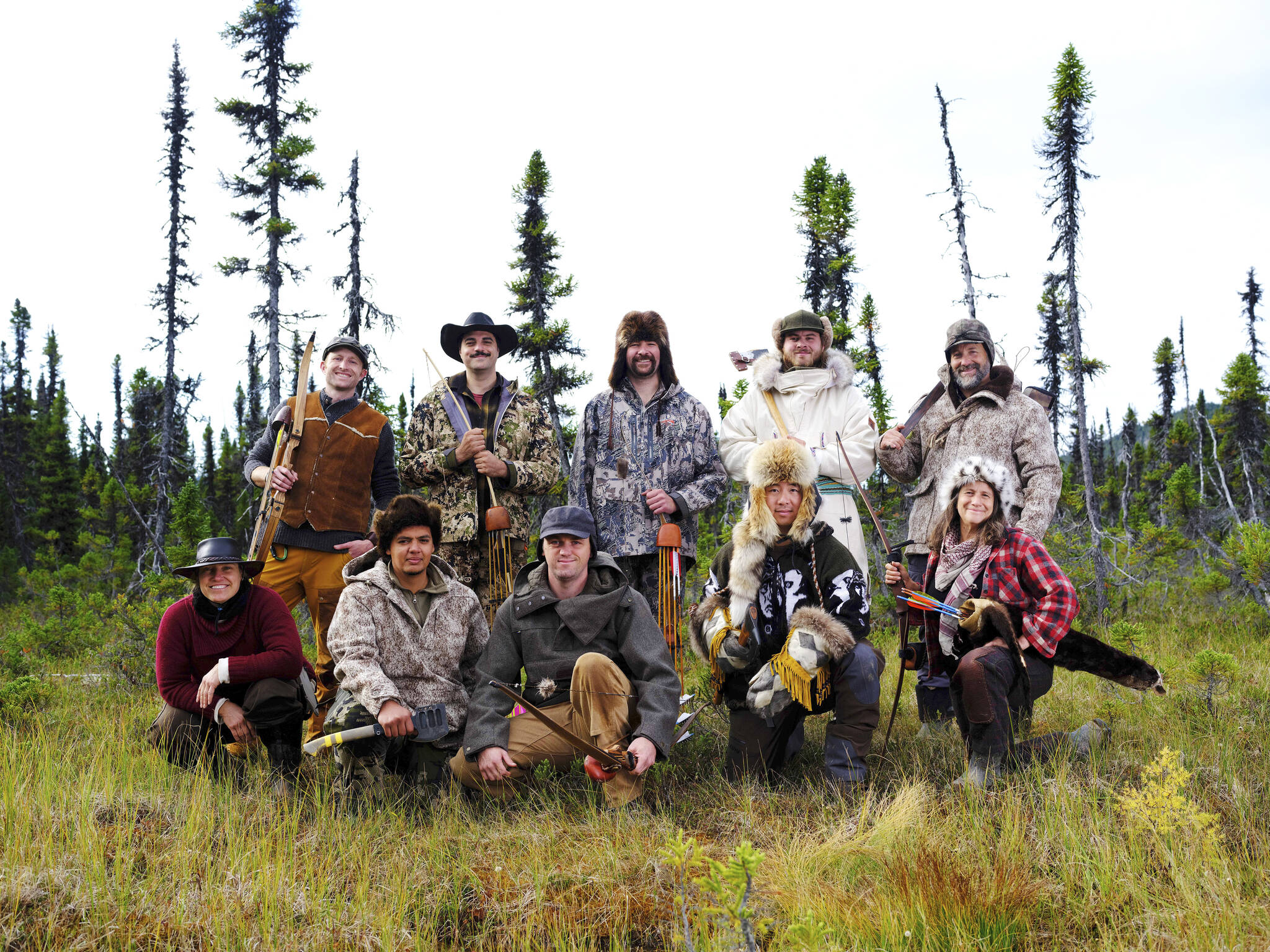 The 10 participants in season 9 of “Alone,” premiering on May 26, 2022, on the History Channel. Terry Burns of Homer is the third from left, back. Another Alaskan in the series, Jacques Tourcotte of Juneau, is the fourth from left, back. (Photo by Brendan George Ko/History Channel)