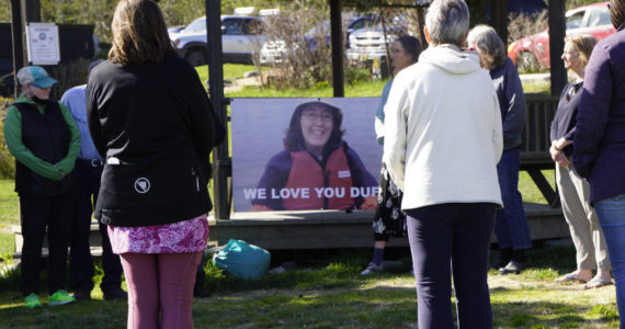 People attend a grief circle for Anesha "Duffy" Murnane on Wednseday, May 18, 2022, at WKFL Park in Homer, Alaska. A Homer man has been charged with the murder and kidnapping of Murnane, who went missing on Oct. 17, 2019. The circle was held to give people a chance to mourn and remember Murnane. 
Homer artist Mavia Muller built a basket for people to place spruce cones in as tokens of memory for Murnane. Muller said the smaller basket will be place in the next Burning Basket, to be called "Breathe."
"It feels like after years of holding our breath we can finally breathe," Muller said at the grief circle.
(Photo by Michael Armstrong/Homer News)