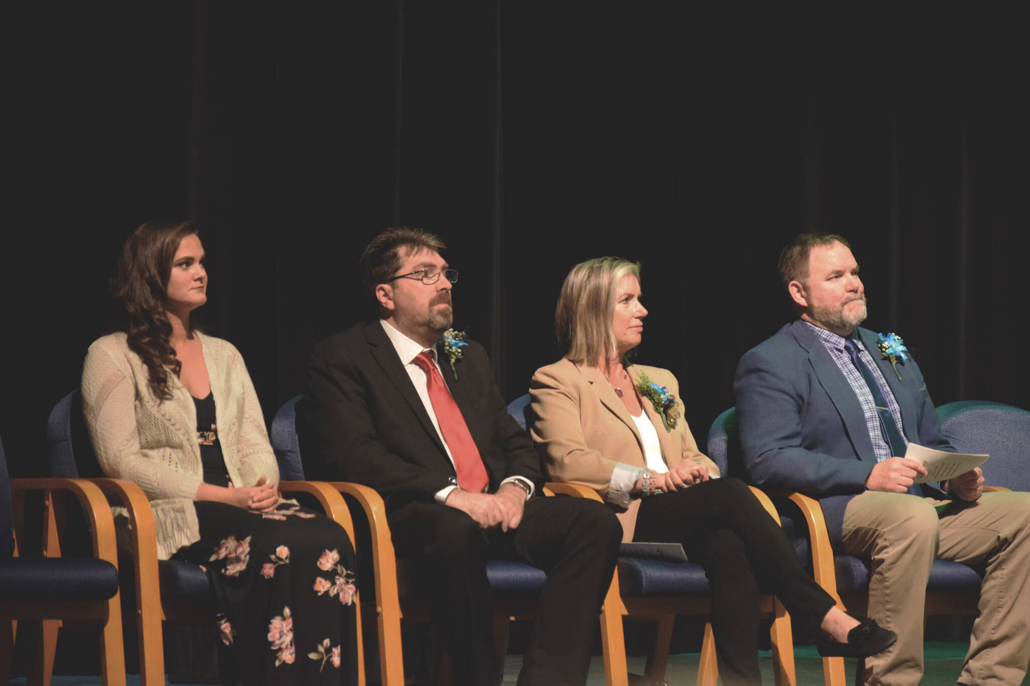 Special guests including Kenai Peninsula Borough School District Superintendent Clayton Holland, far right, attend Connections Homeschool’s commencement ceremony on Thursday, May 19, 2022, in Soldotna, Alaska. (Ashlyn O’Hara/Peninsula Clarion)