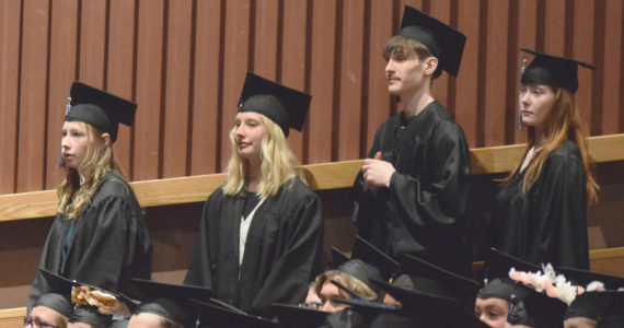 Graduates wait to receive diplomas during Connections Homeschool’s commencement ceremony on Thursday, May 19, 2022, in Soldotna, Alaska. (Ashlyn O’Hara/Peninsula Clarion)