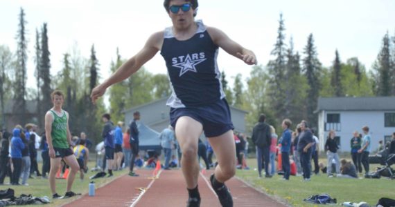 Soldotna's Isaac Chavarria competes in the triple jump at the Region 3/Division I meet at Ed Hollier Field at Kenai Central High School in Kenai, Alaska, on Saturday, May 21, 2022. (Photo by Jeff Helminiak/Peninsula Clarion)