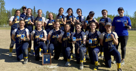 The Homer Mariners softball team poses after winning the region championship for the fifth year in a show. (Photo by Monica Anderson)