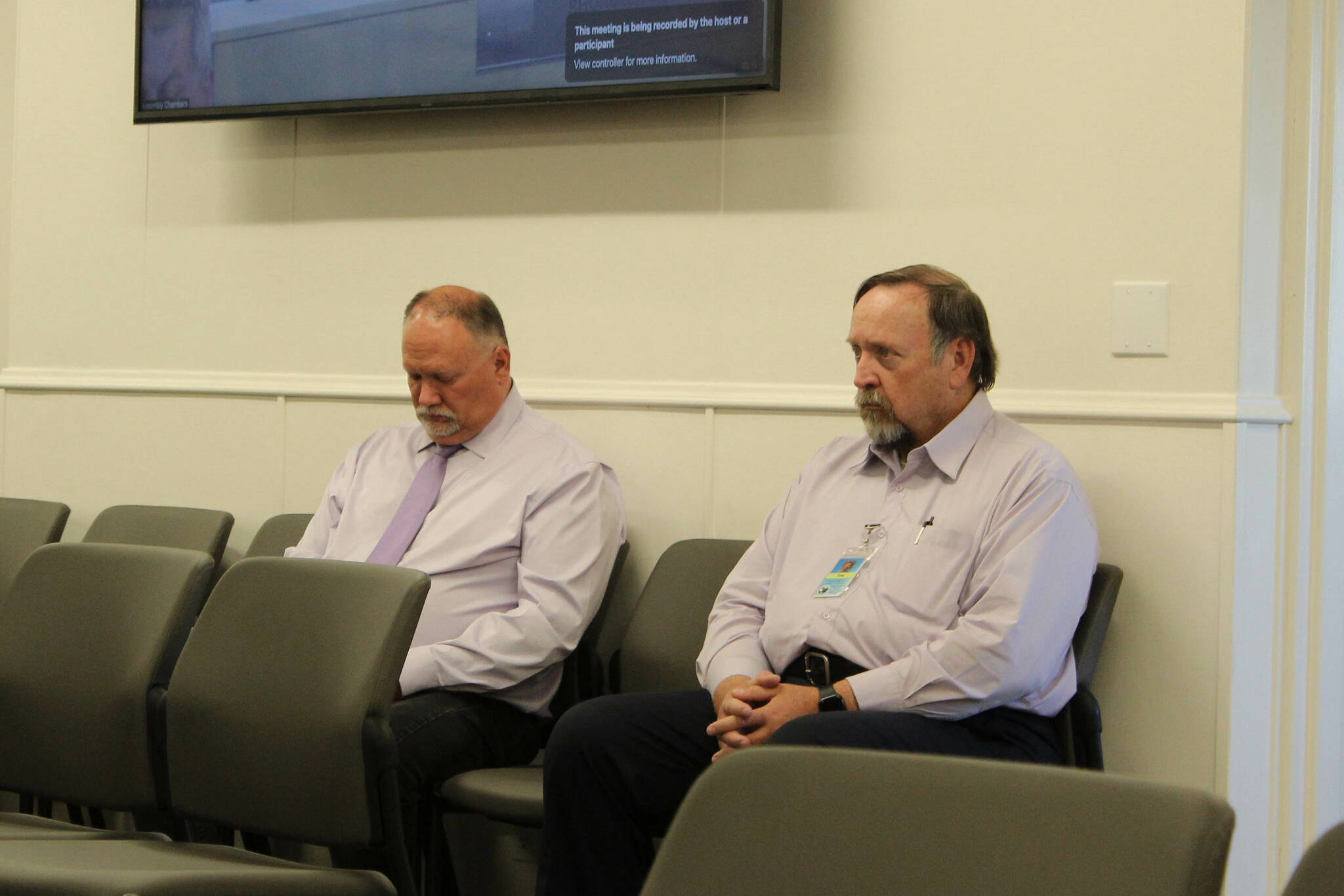 Kevin Lyon (left) and John Hedges (right) attend a meeting of the Kenai Peninsula Borough Assembly on Tuesday, June 21, 2022 in Soldotna, Alaska. The two have worked to address deferred maintenance at Kenai Peninsula Borough School District facilities. (Ashlyn O’Hara/Peninsula Clarion)