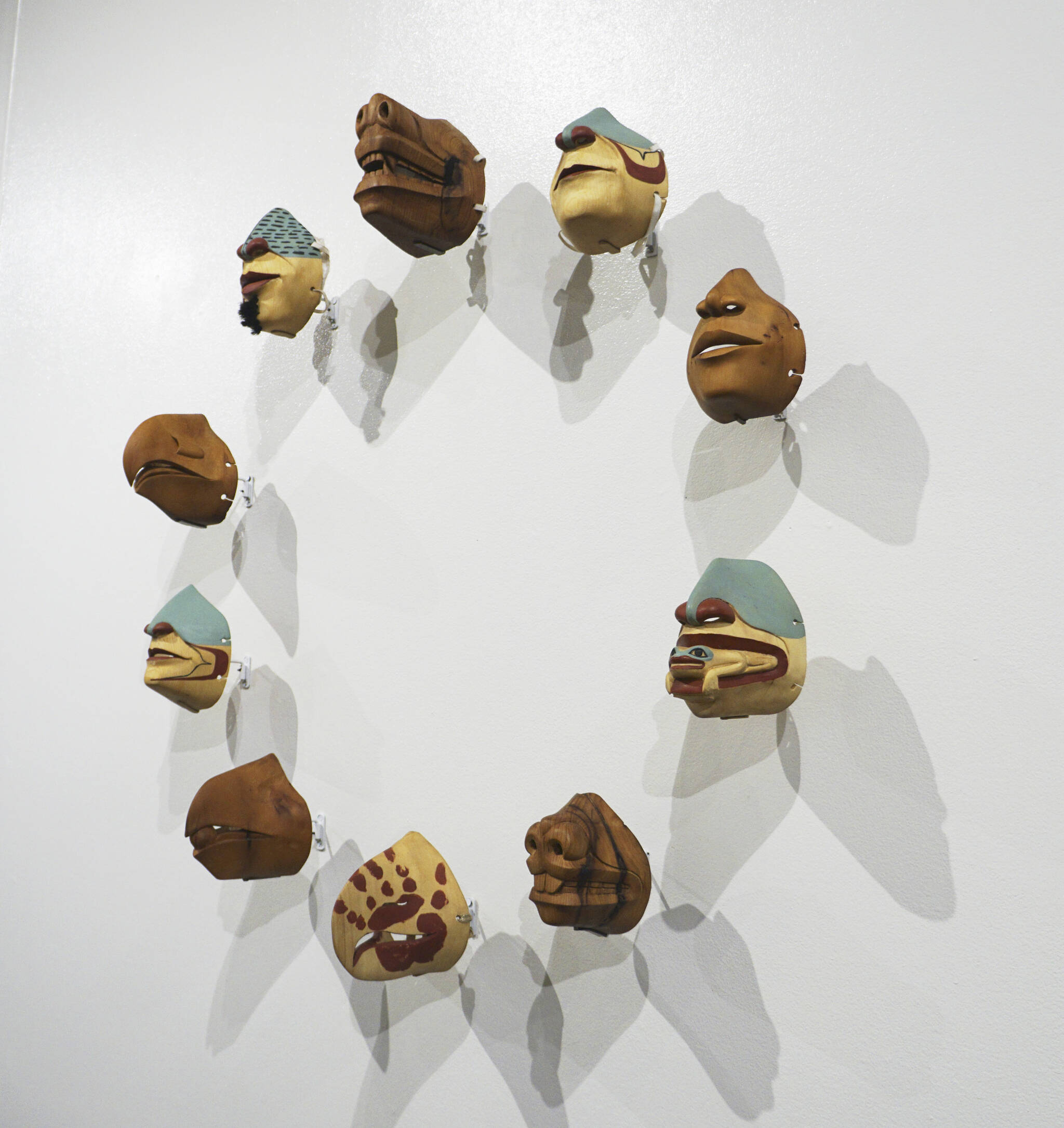 “We’re Still Here,” masks made by Naal xàk’w/Tommy Joseph, are in “Protection: Adaptation and Resistance,” on exhibit at the Pratt Museum & Park in Homer, Alaska, through Sept. 24, 2022. Naal xàk’w, of Sitka, made the masks to fit over N-95 facemasks to promote mask wearing. (Photo by Michael Armstrong/Homer News)