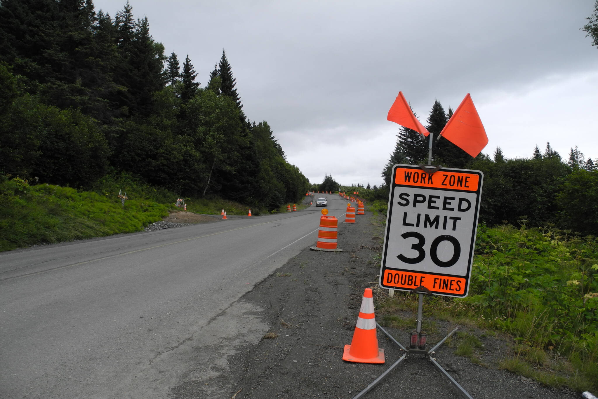 Sign cautioning drivers on East Hill Road on Monday, July 25, 2022, in Homer, Alaska. (Photo by Charlie Menke/Homer News)