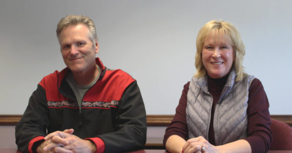 Gov. Mike Dunleavy, left, and Nancy Dahlstrom sit in the Peninsula Clarion offices on Friday, July 22, 2022 in Kenai, Alaska. (Ashlyn O’Hara/Peninsula Clarion)