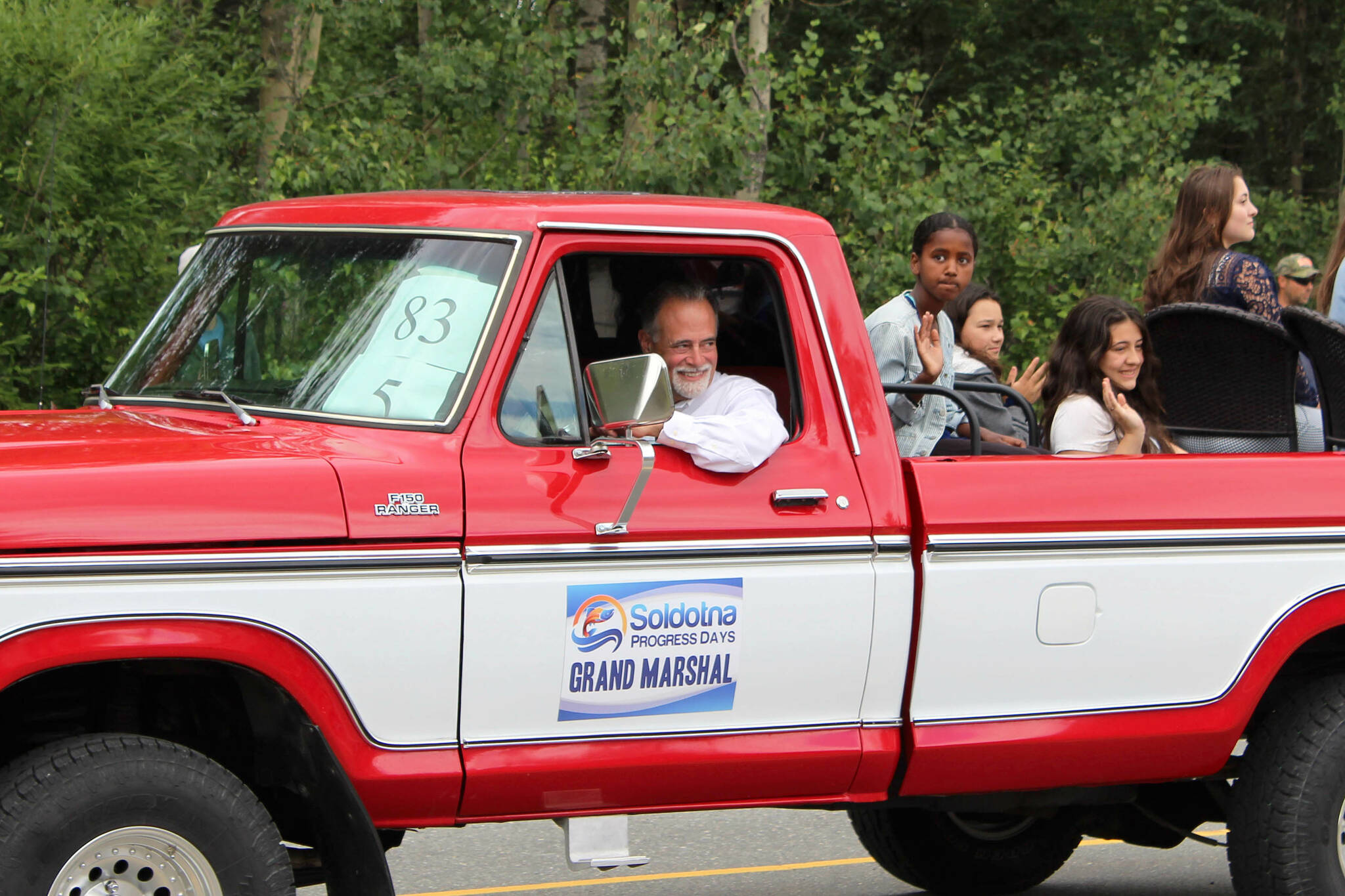 Alaska State Sen. Peter Micciche waves to attendees during the 65th annual Soldotna Progress Days Parade on Saturday, July 23, 2022, in Soldotna, Alaska. Micciche, who currently serves as president of the Alaska Senate, was named this year’s grand marshal. (Ashlyn O’Hara/Peninsula Clarion)