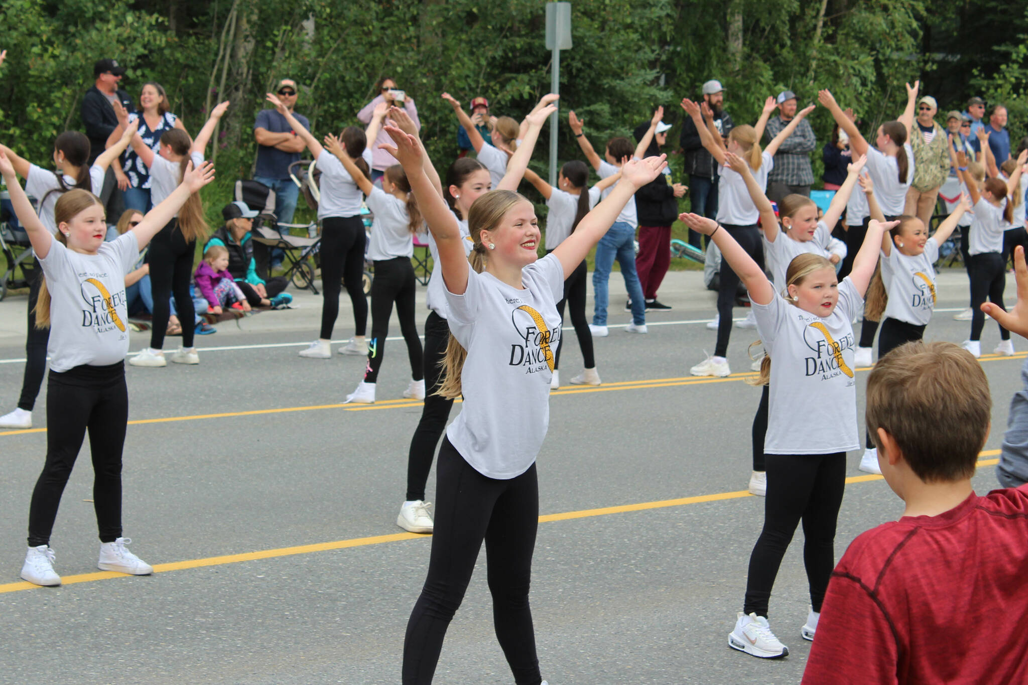 Performers with Forever Dance participate in the 65th annual Soldotna Progress Days Parade on Saturday, July 23, 2022, in Soldotna, Alaska. (Ashlyn O’Hara/Peninsula Clarion)
