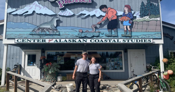 Emily Matthews and Andy Kowalczyk pose outside the Center for Alaskan Coastal Studies headquarters on Friday, July 29, 2022, in Homer, Alaska. (Photo by Charlie Menke/Homer News)