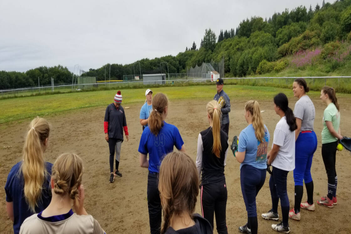 Kenai Peninsula players participate in a softball clinic at Karen Hornaday Park on Saturday, July 30, 2022. (Photo by Bill Bell)