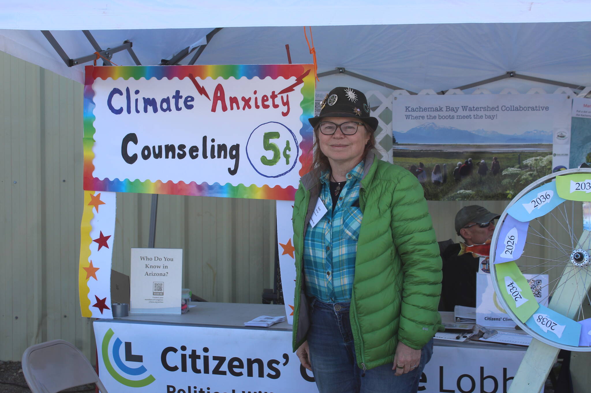 Sarah McCabe, of the Anchorage chapter of the Citizens’ Climate Lobby, speaks about climate change at Salmonfest in Ninilchik, Alaska, on Friday, Aug. 5, 2022. (Ashlyn O’Hara/Peninsula Clarion)