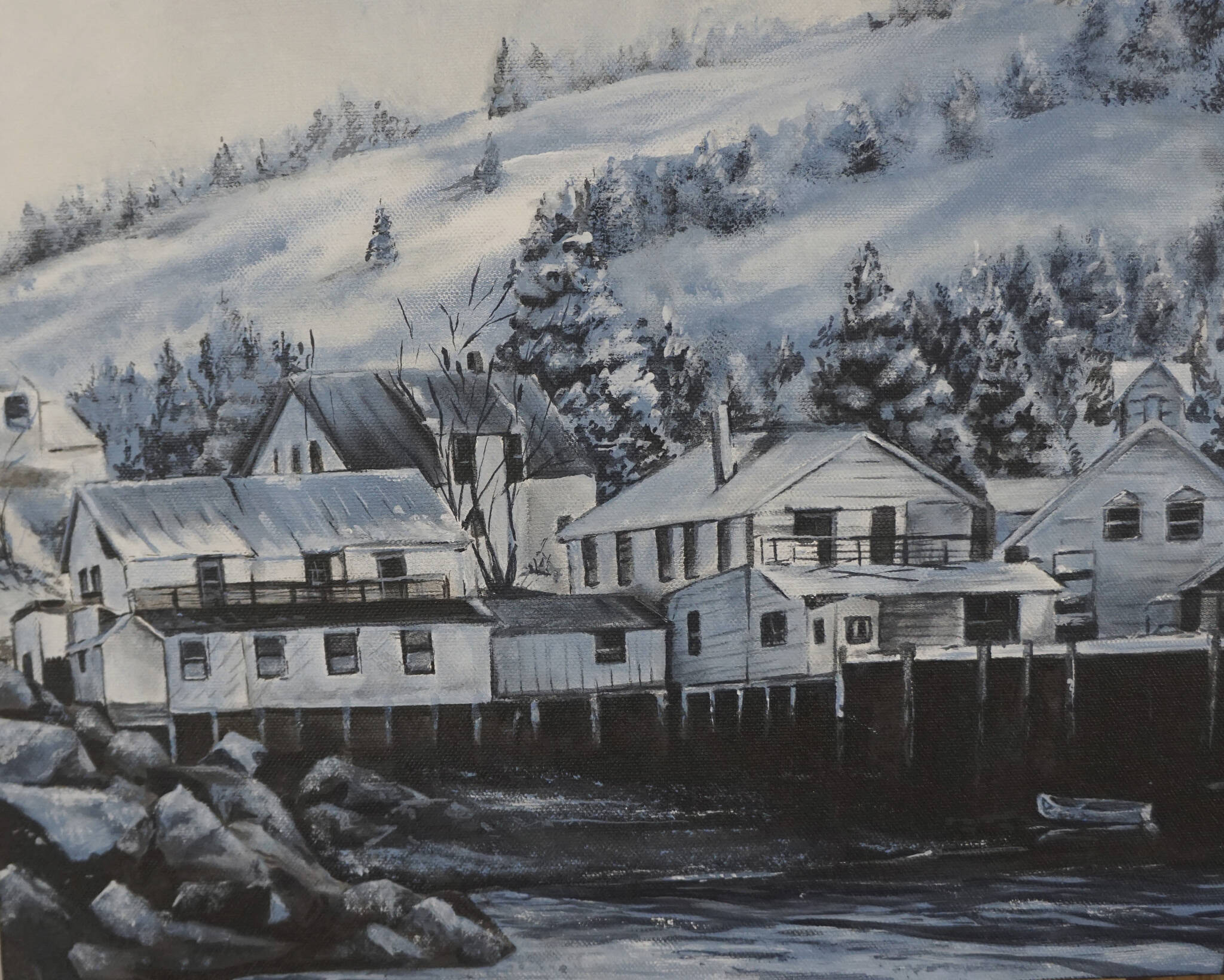 Kate Lochridge’s historical painting of Seldovia, Alaska, shows the old boardwalk before it got flooded by high tides after the 1964 Great Alaska Earthquake. Another painting shows the town after the high tide. (Photo by MIchael Armstrong/Homer News)