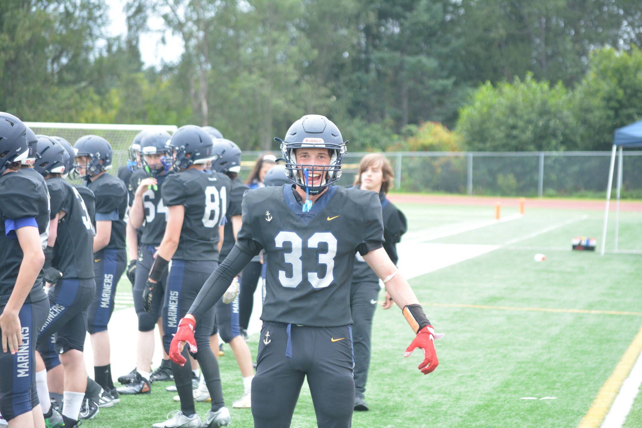Mariner Jake Tappan celebrates after an invigorated on-field performance on Saturday, Aug. 13, 2022, at Homer High School in Homer, Alaska. (Photo by Charlie Menke/ Homer News)