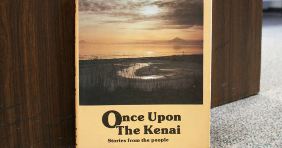 A copy of “Once Upon the Kenai: Stories from the People” rests against a desk inside the Peninsula Clarion’s offices on Wednesday, Aug. 3, 2022, in Kenai, Alaska. (Ashlyn O’Hara/Peninsula Clarion)