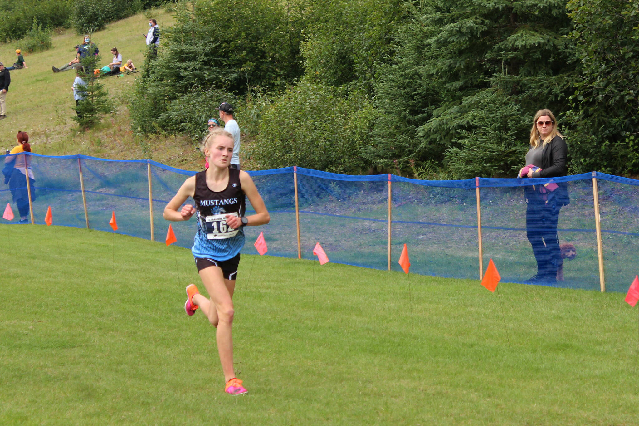 Chugiak High School’s Cameron Peterson races to victory at the 2022 Ted McKenney XC Running Invitational at Tsalteshi Trails at Skyview Middle School on Saturday, Aug. 20, 2022 in Soldotna, Alaska. (Ashlyn O’Hara/Peninsula Clarion)