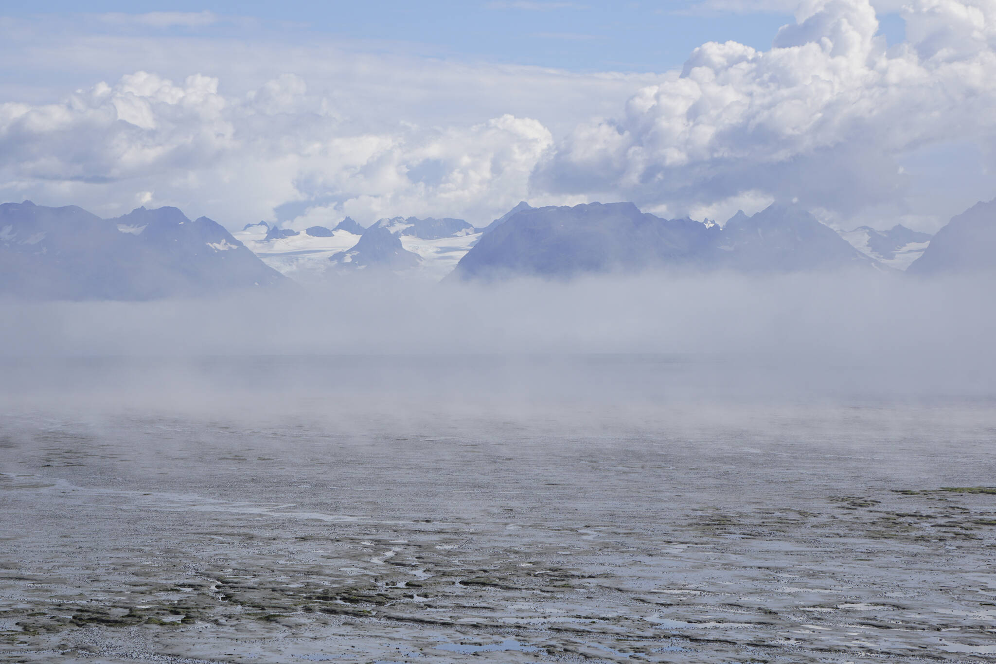 Fog rolls over Mud Bay on Monday, Aug. 29, 2022, in Homer, Alaska. (Photo by Michael Armstrong/Homer News)