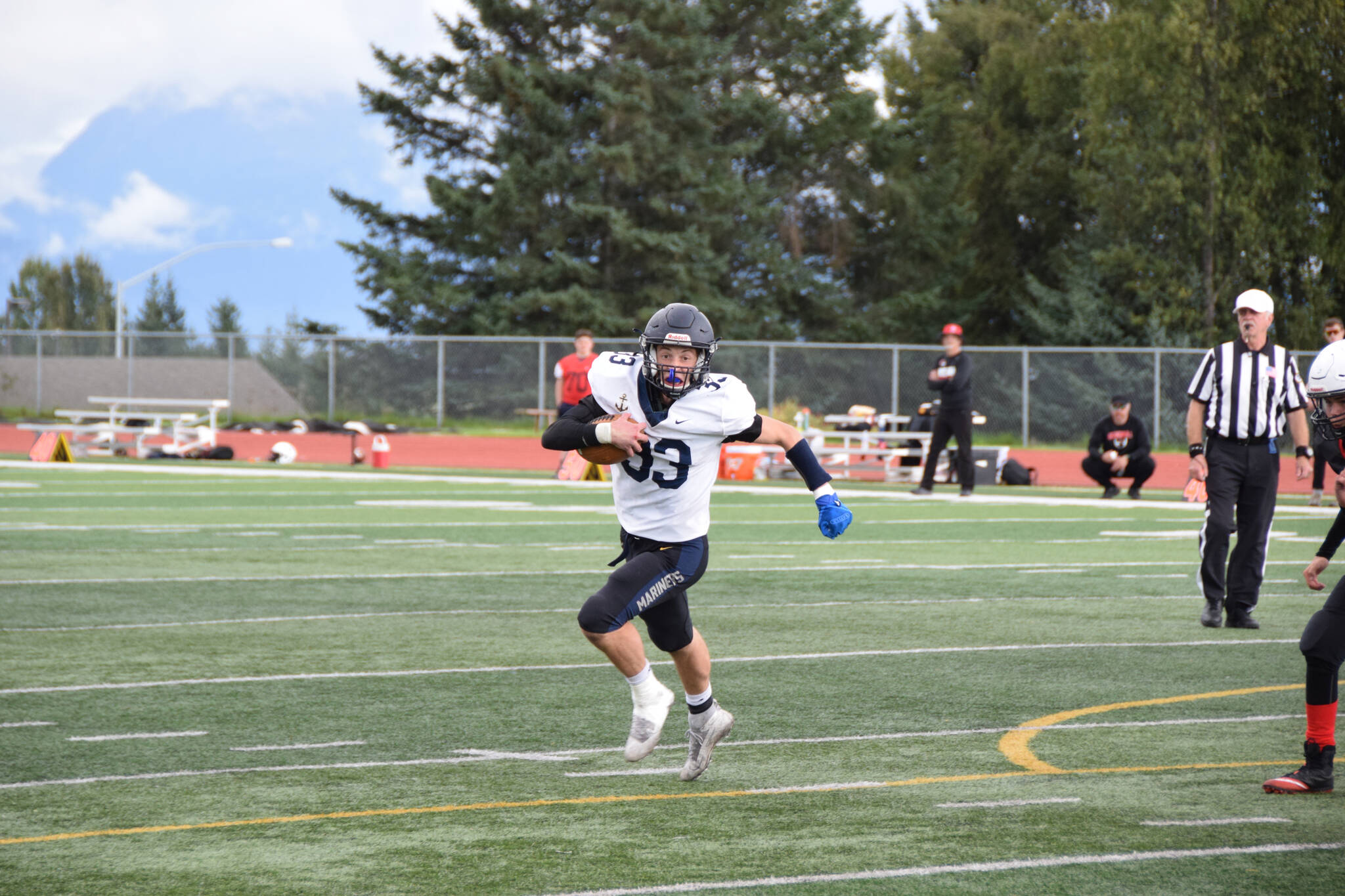 Jake Tappan sprints to the end-zone on Saturday, Sep. 3, at the Homer High School Field in Homer, Alaska. (Photo by Charlie Menke/ Homer News)