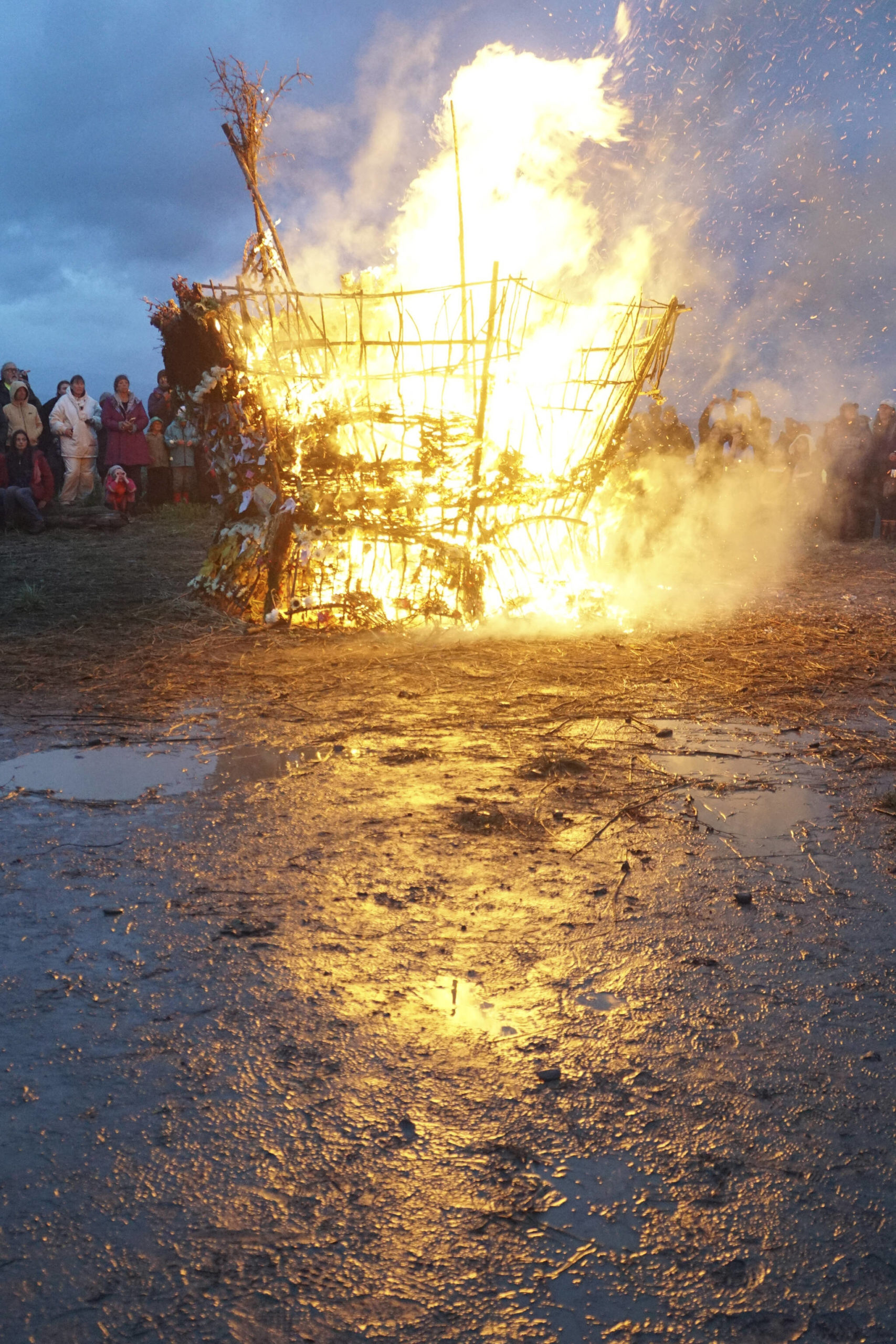 As about 200 people watch, the 19th annual Burning Basket, “Breathe,” catches fire on Sunday, Sept. 11, 2022, at Mariner Park on the Homer Spit in Homer, Alaska. (Photo by Michael Armstrong/Homer News)
