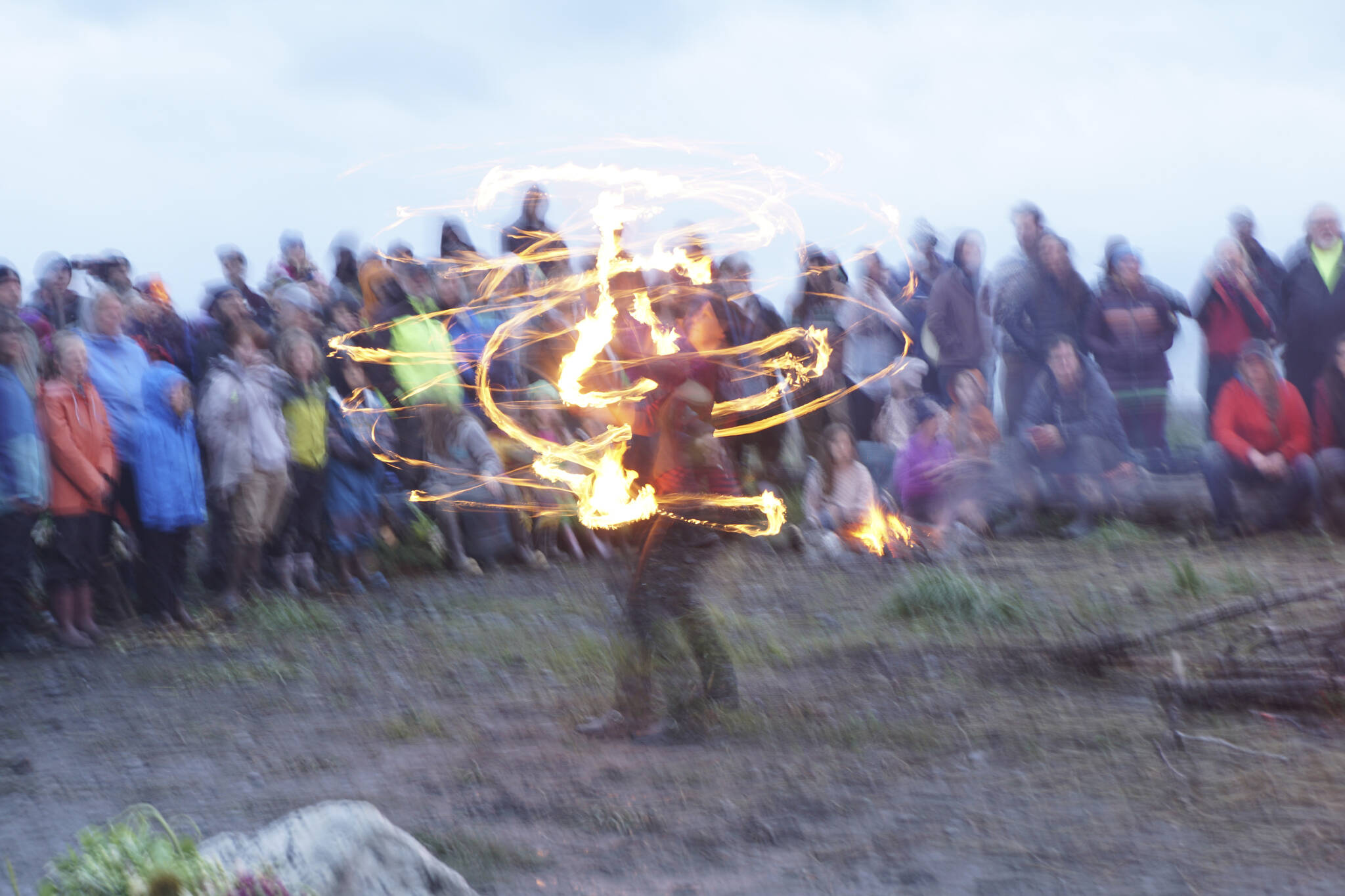 A fire dancer spins flames at the 19th annual Burning Basket, “Breathe,” on Sunday, Sept. 11, 2022, at Mariner Park on the Homer Spit in Homer, Alaska. (Photo by Michael Armstrong/Homer News)